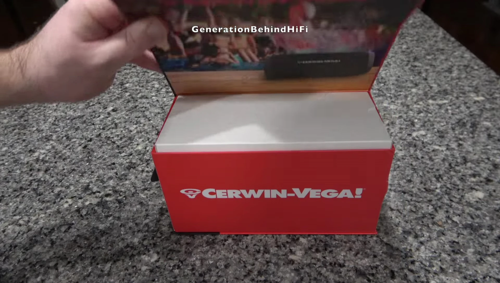 The Cerwin-Vega VegaMini box with a picture of people enjoying the speaker.
