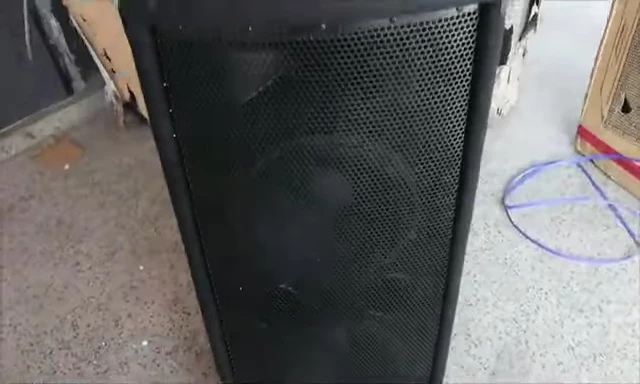 Close-up showing the speaker's full mesh grille.