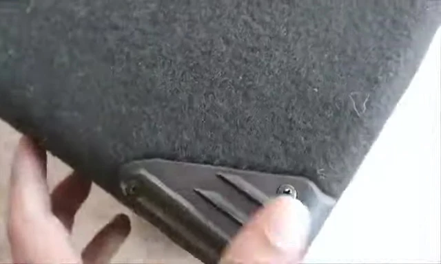 The speaker's handle and cloth covering.