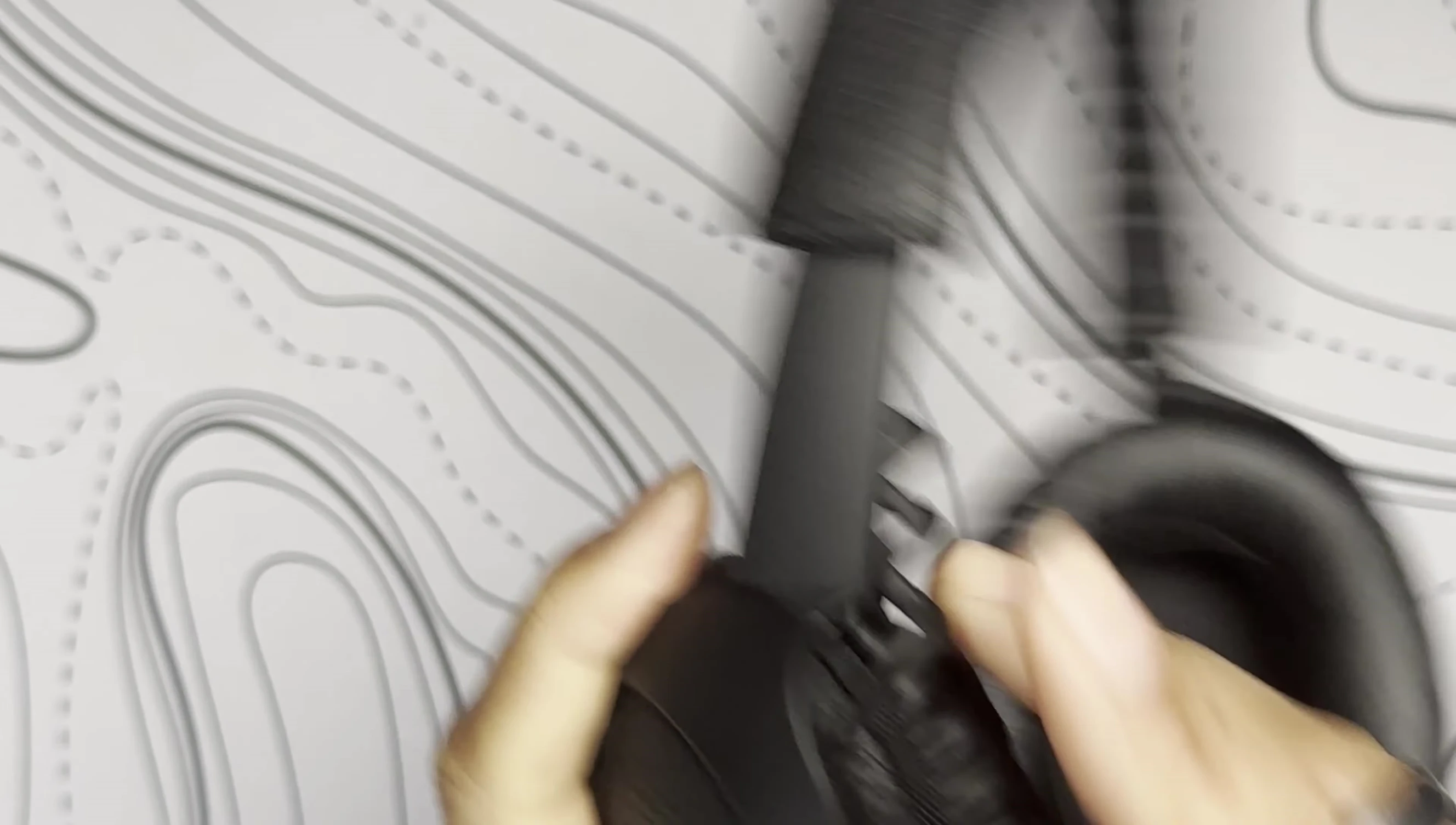 The ANC button on the headphones