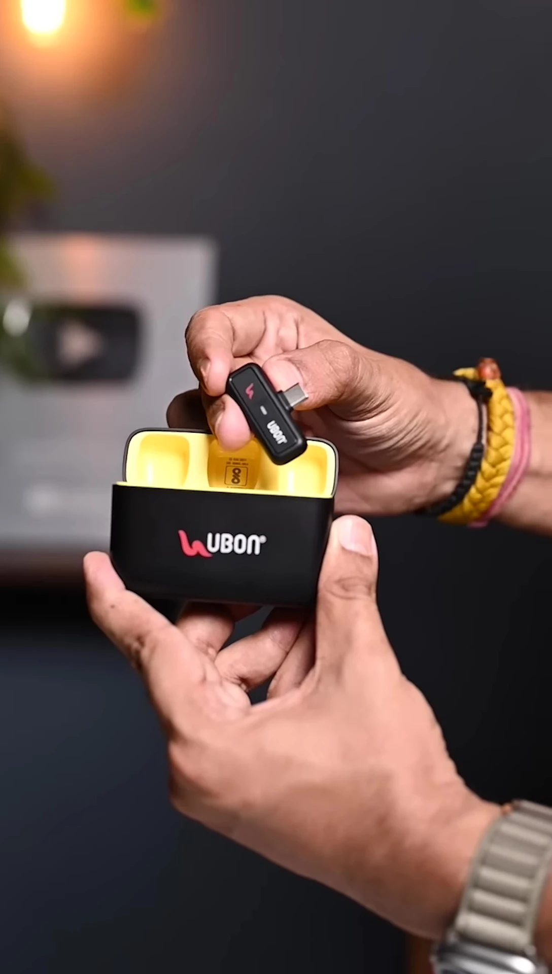 Unboxing the Ubon Podcast Series wireless microphone system, showing the mics, receiver, and power case.