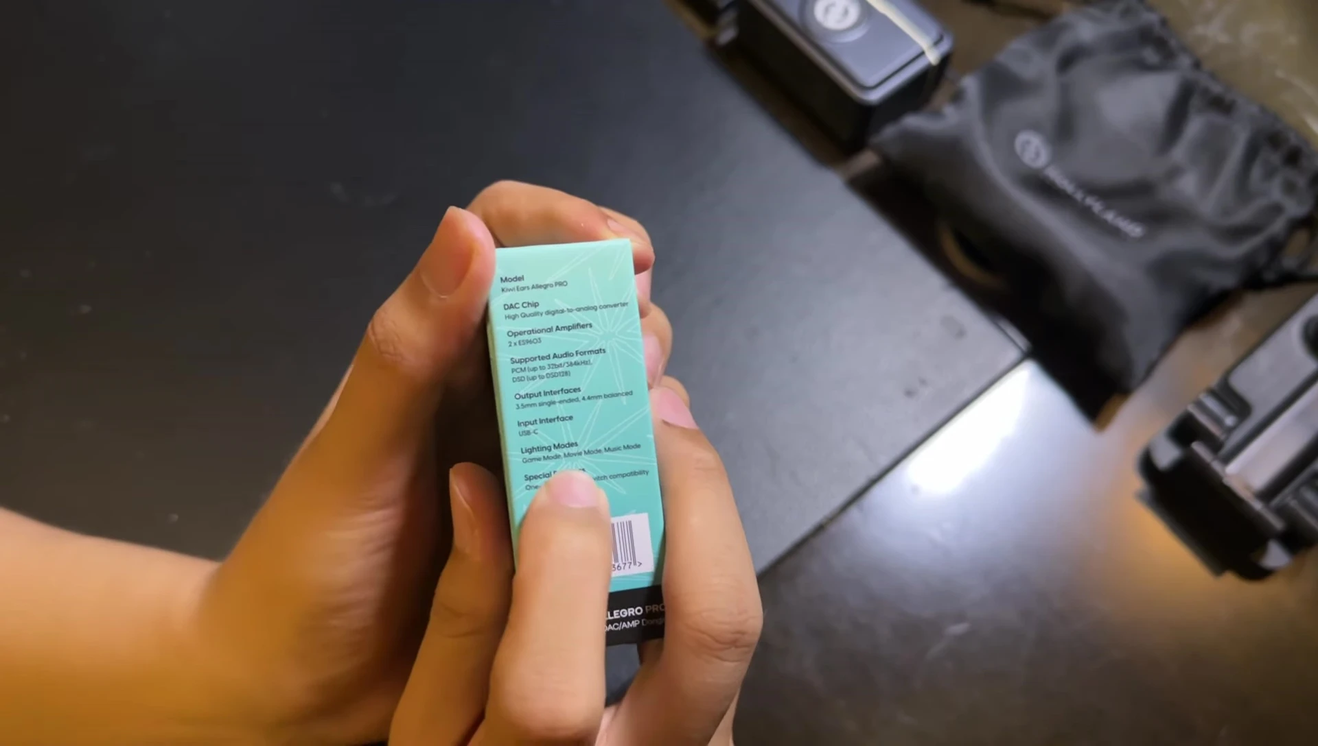 The single button on the device highlighting the color-changing feature