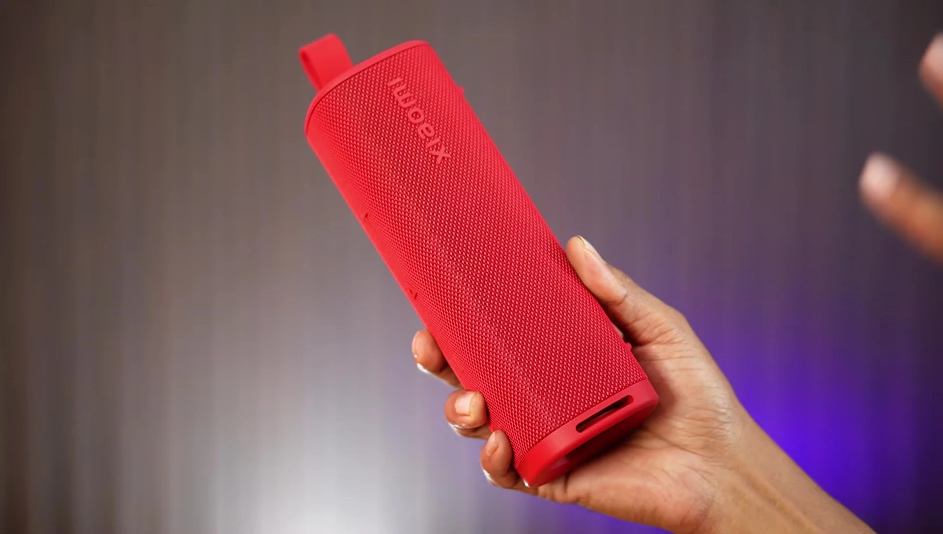 Close-up of Xiaomi 30W Speaker showing the fabric mesh and overall design.