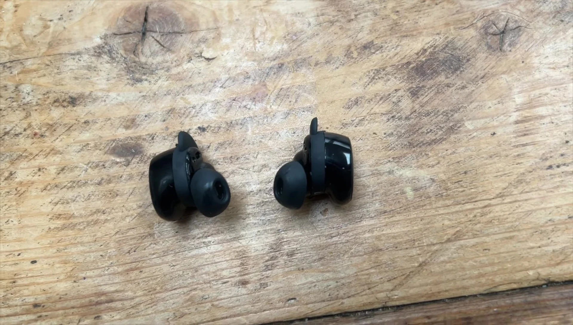 Earbuds being charged