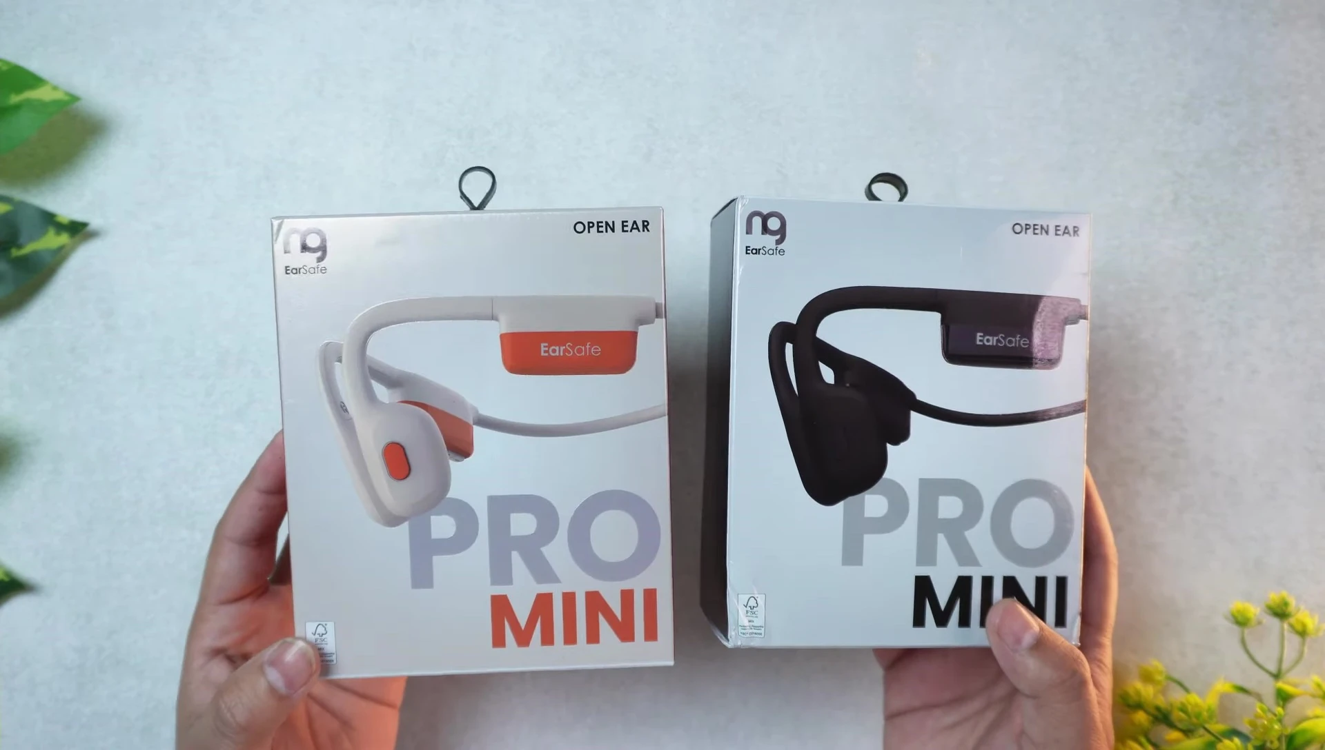 Two EarSafe Pro Mini boxes in different colors displayed.