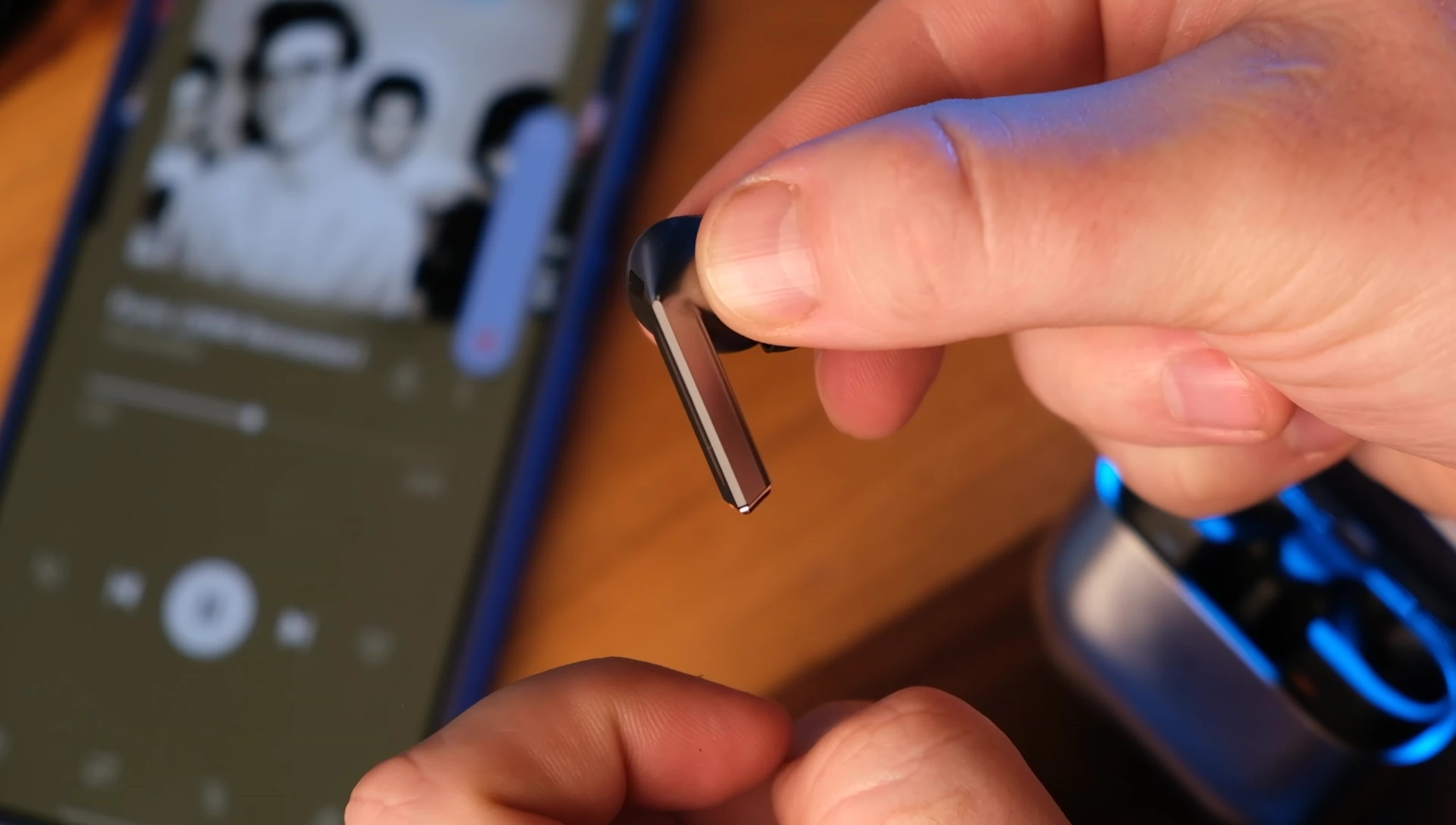 User demonstrating the volume control gesture.