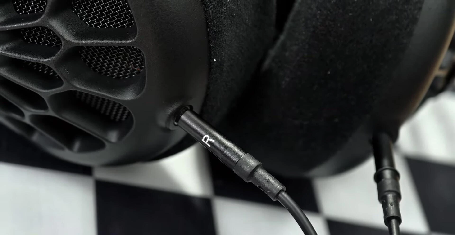 Image of the reviewer listening to the headphones