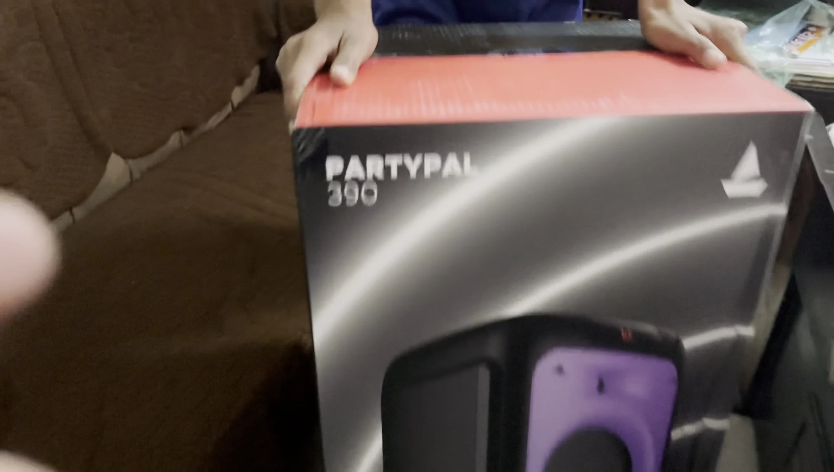 Inside the box, showcasing the PartyPal 390 and accessories