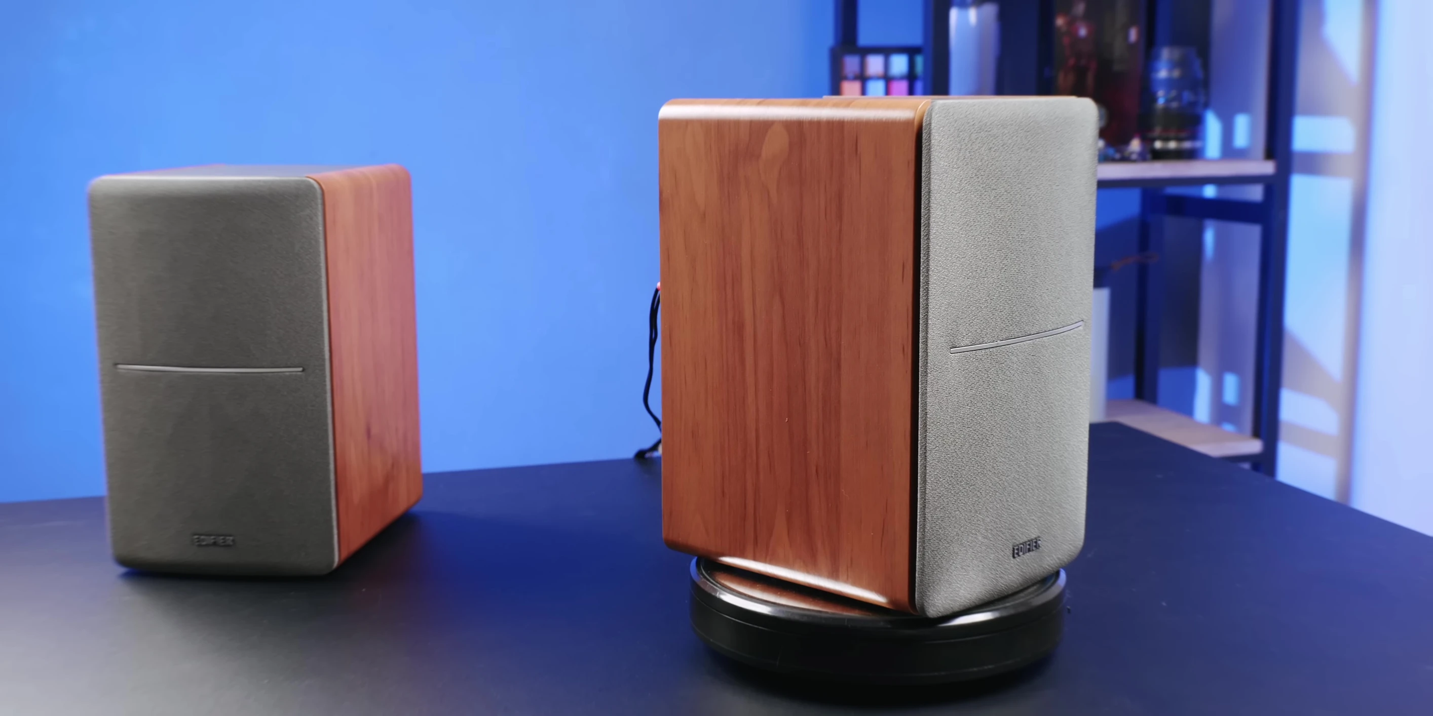 Close-up of the Edifier R1280DB speaker showcasing its wood finish