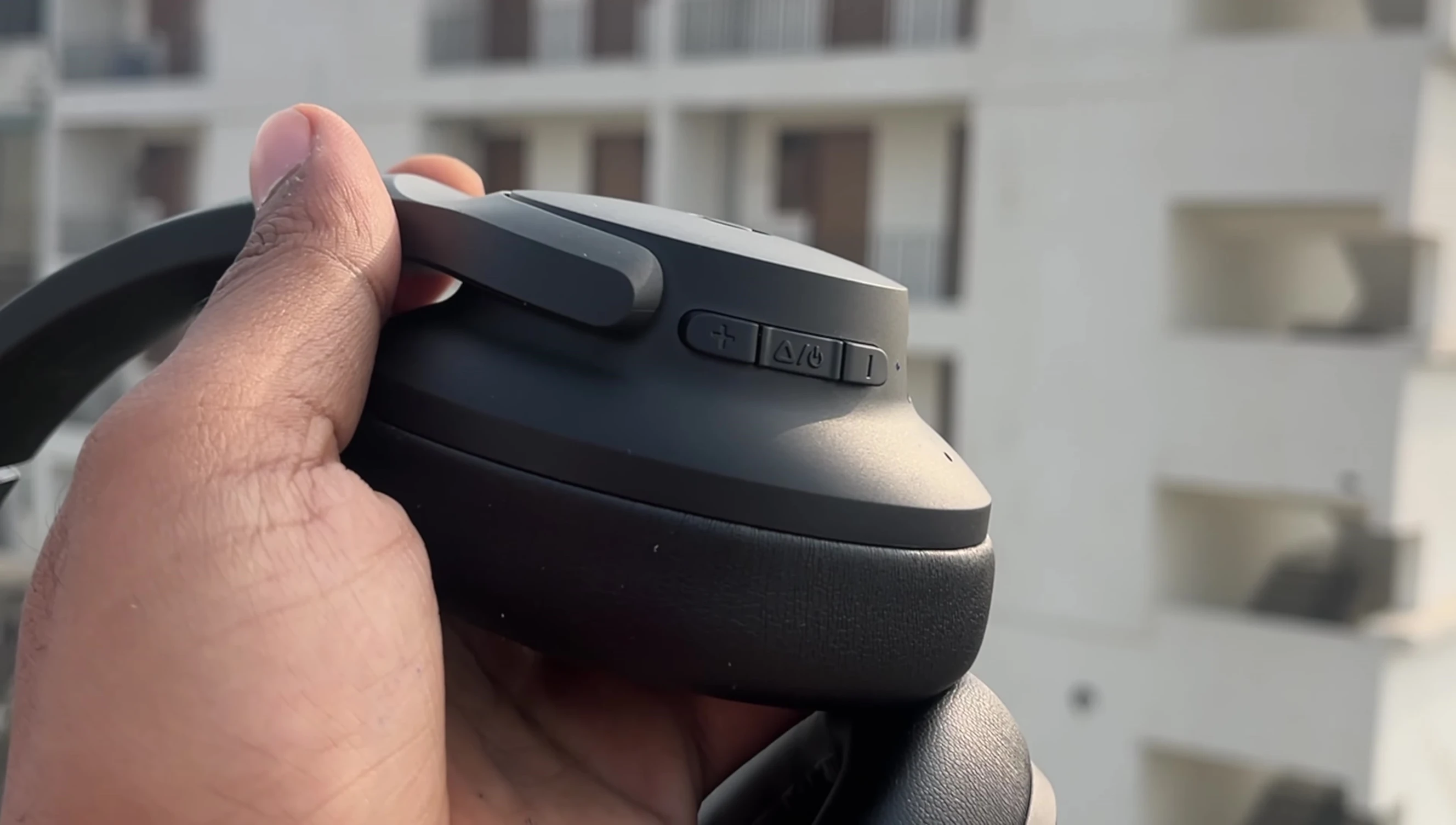 Close-up of the right earcup, showing the controls