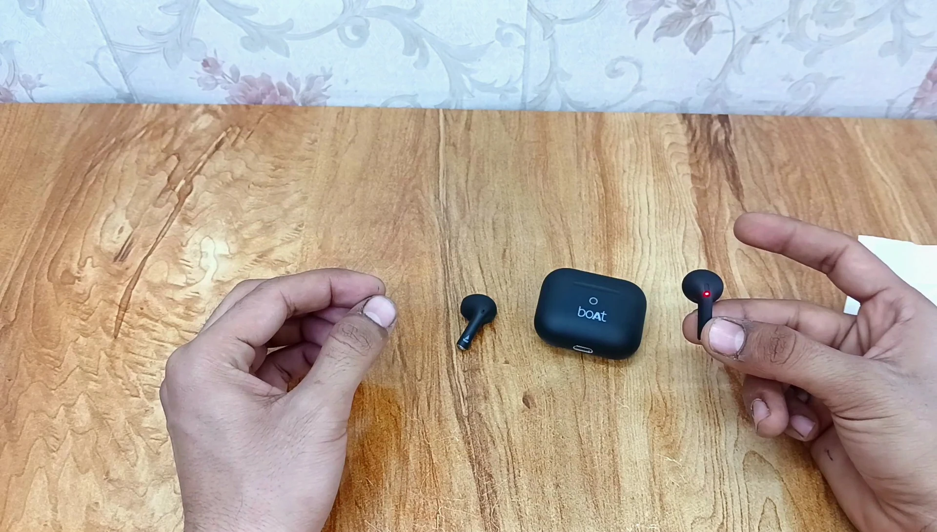 The earbuds fitting comfortably in the ear.