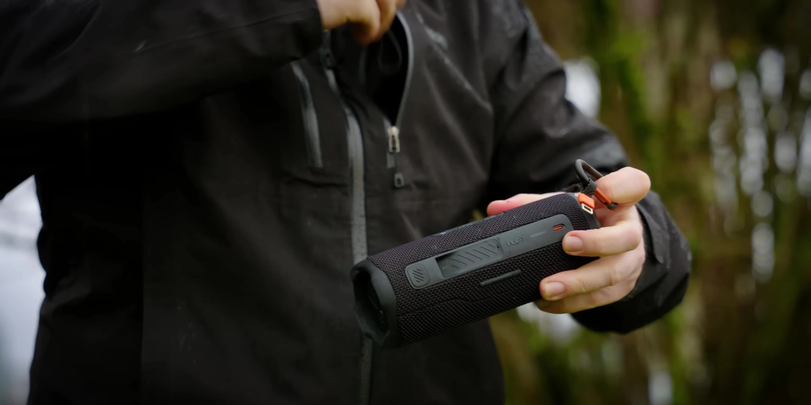 Close-up of the JBL Flip 7's quick-release carrying system