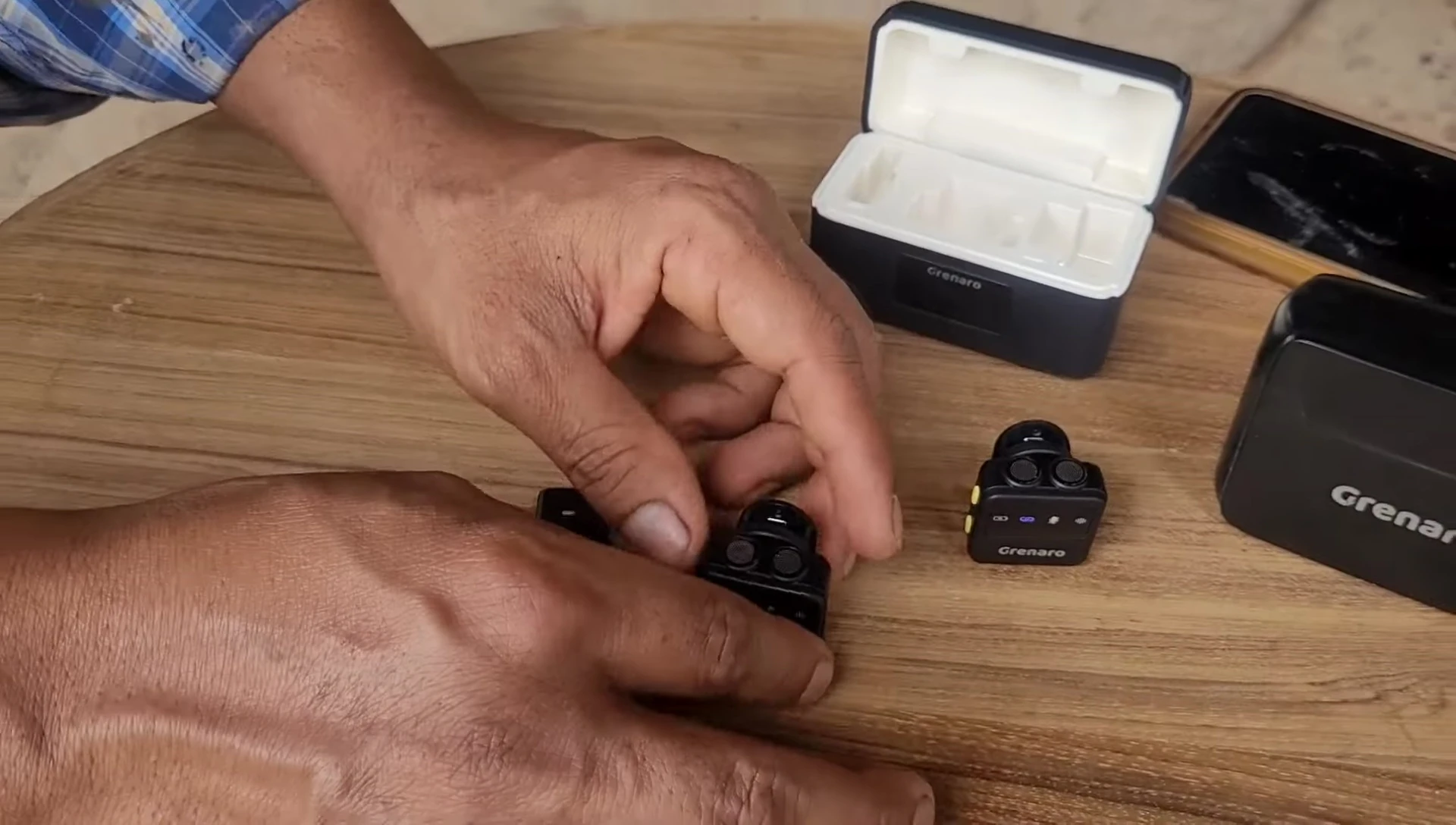 Mics turning on automatically when removed from the case