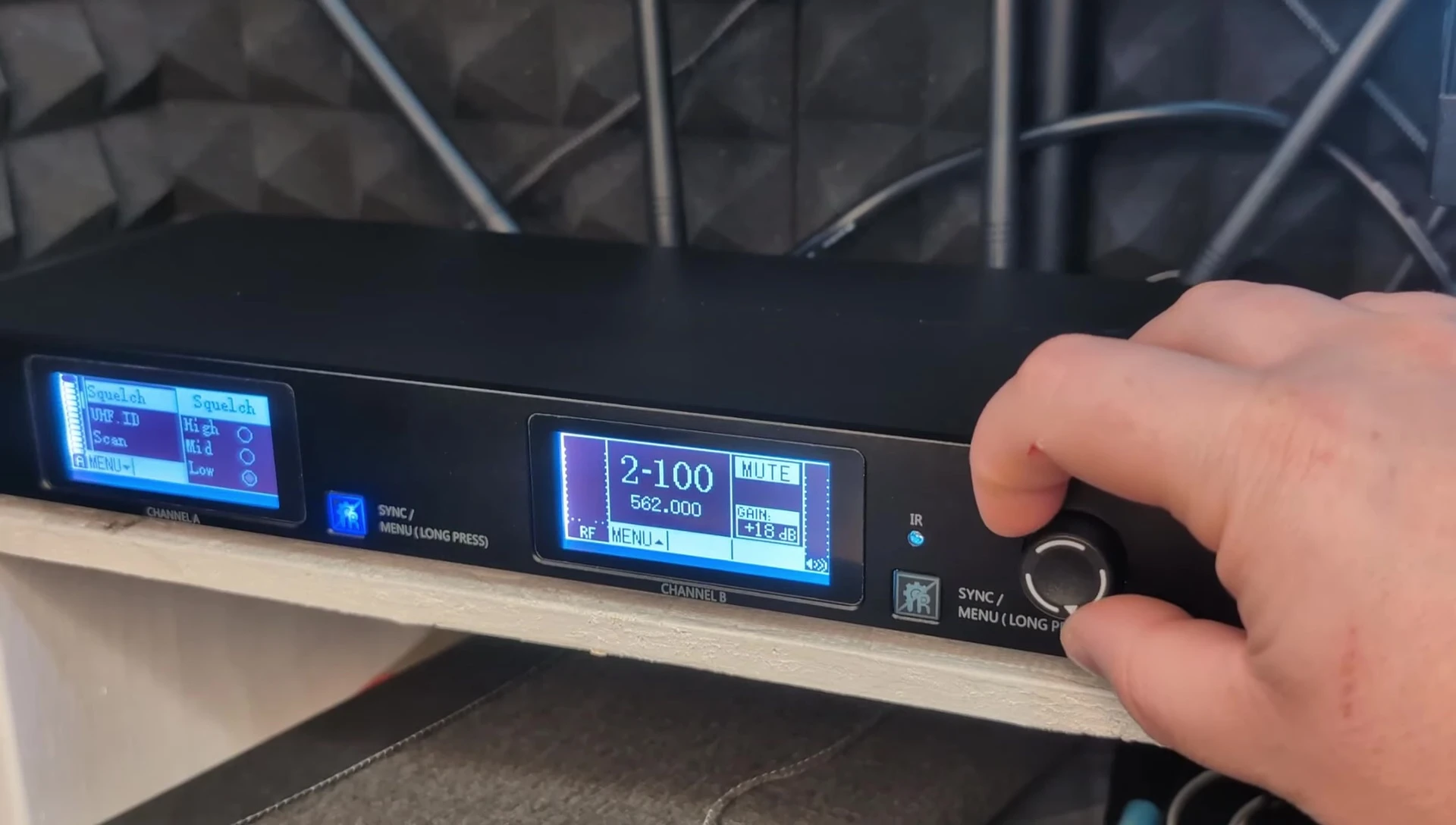 Close-up of the receiver controls, highlighting the ID Lock function