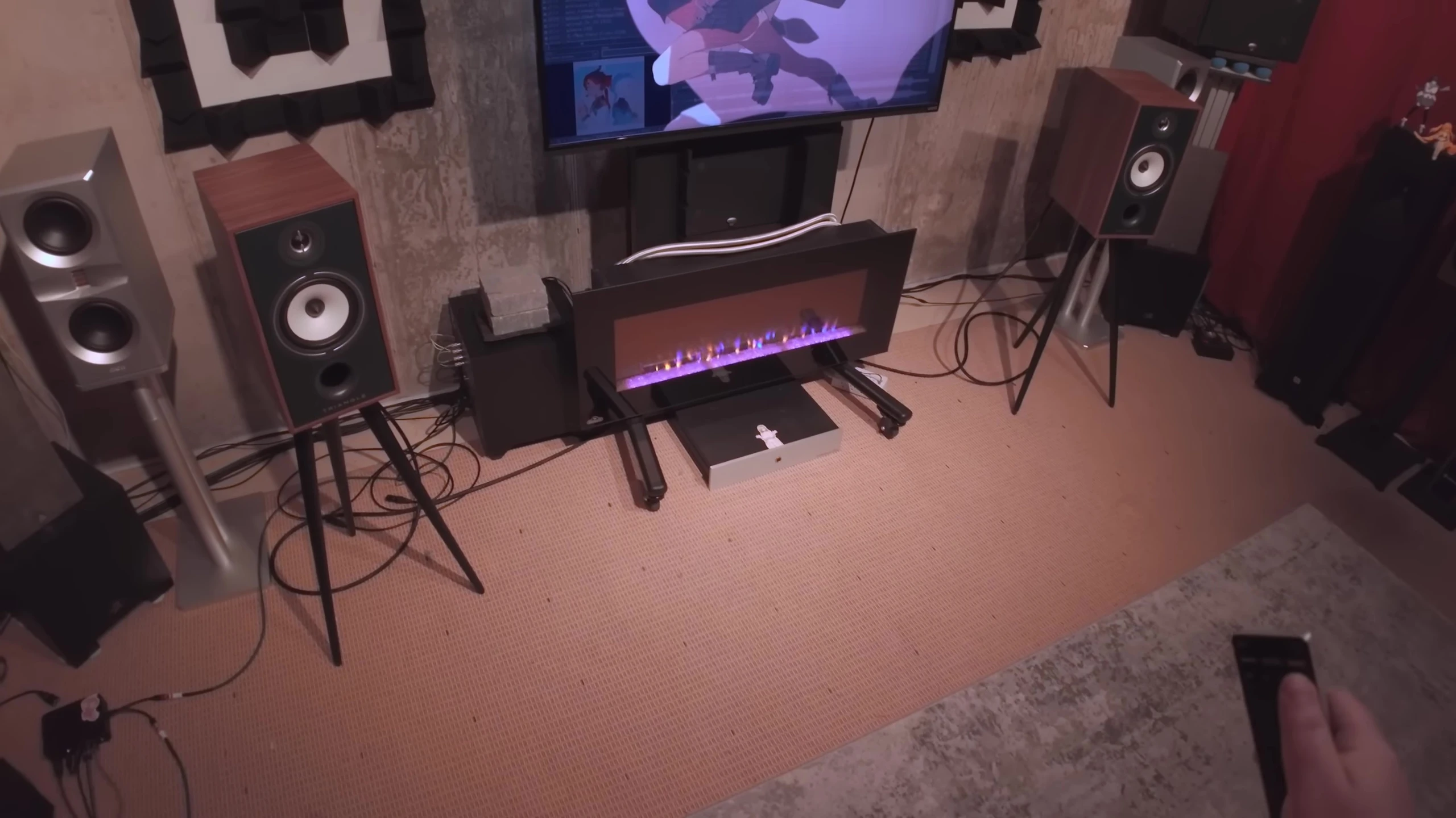 The reviewer mentions watching anime and other media to assess the speakers’ performance beyond music