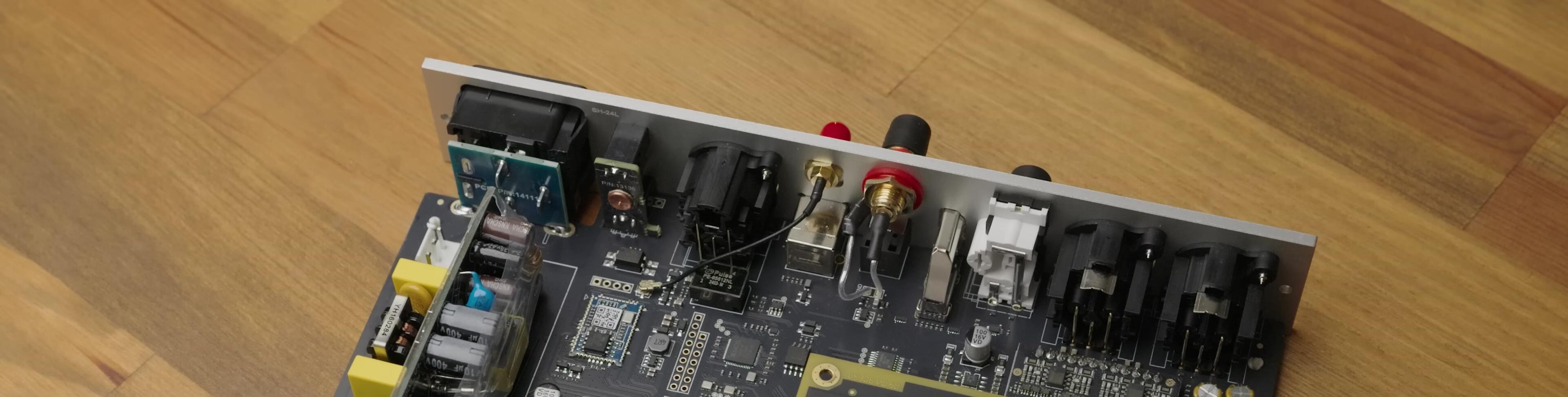 Internal view of the Topping Centaurus, showcasing the power supply and XMOS chip.
