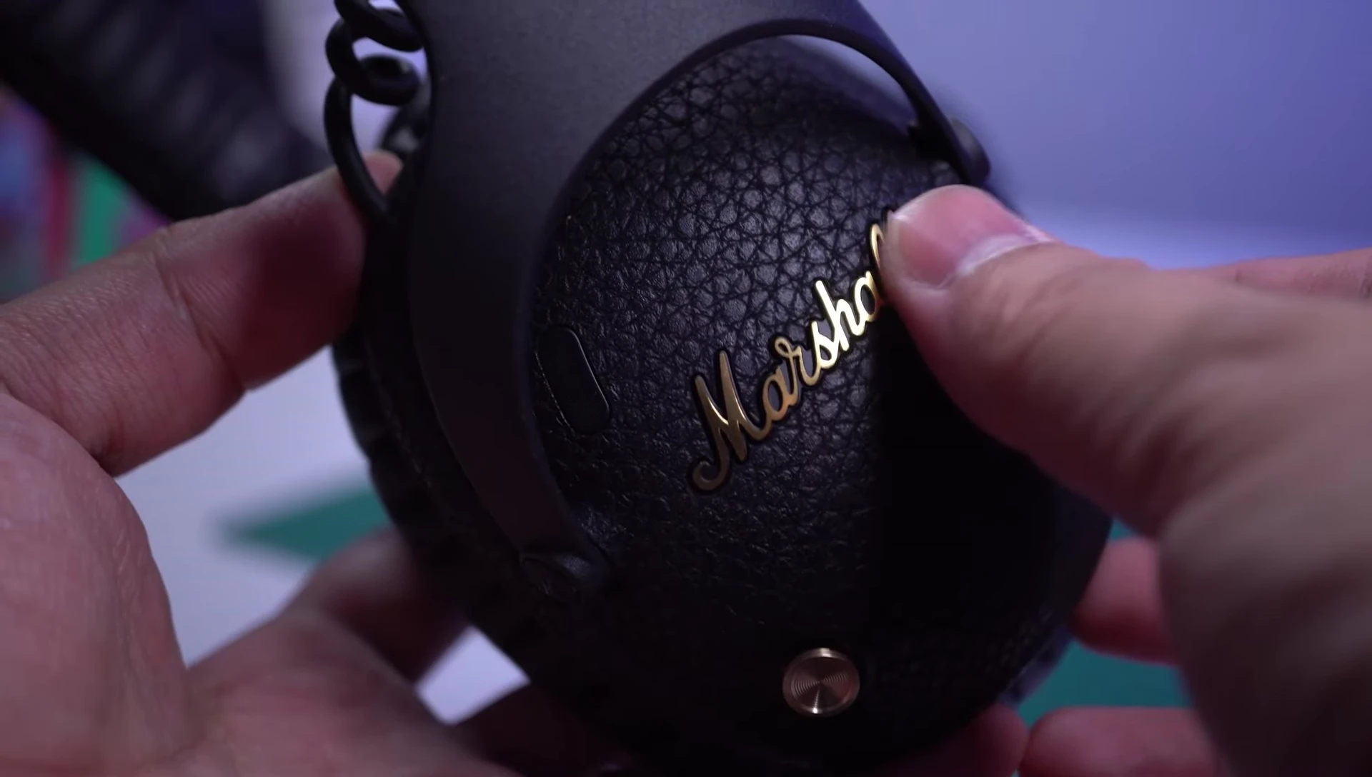 Close-up of the Marshall Monitor III ANC headphones showcasing the metal headband and earcups.