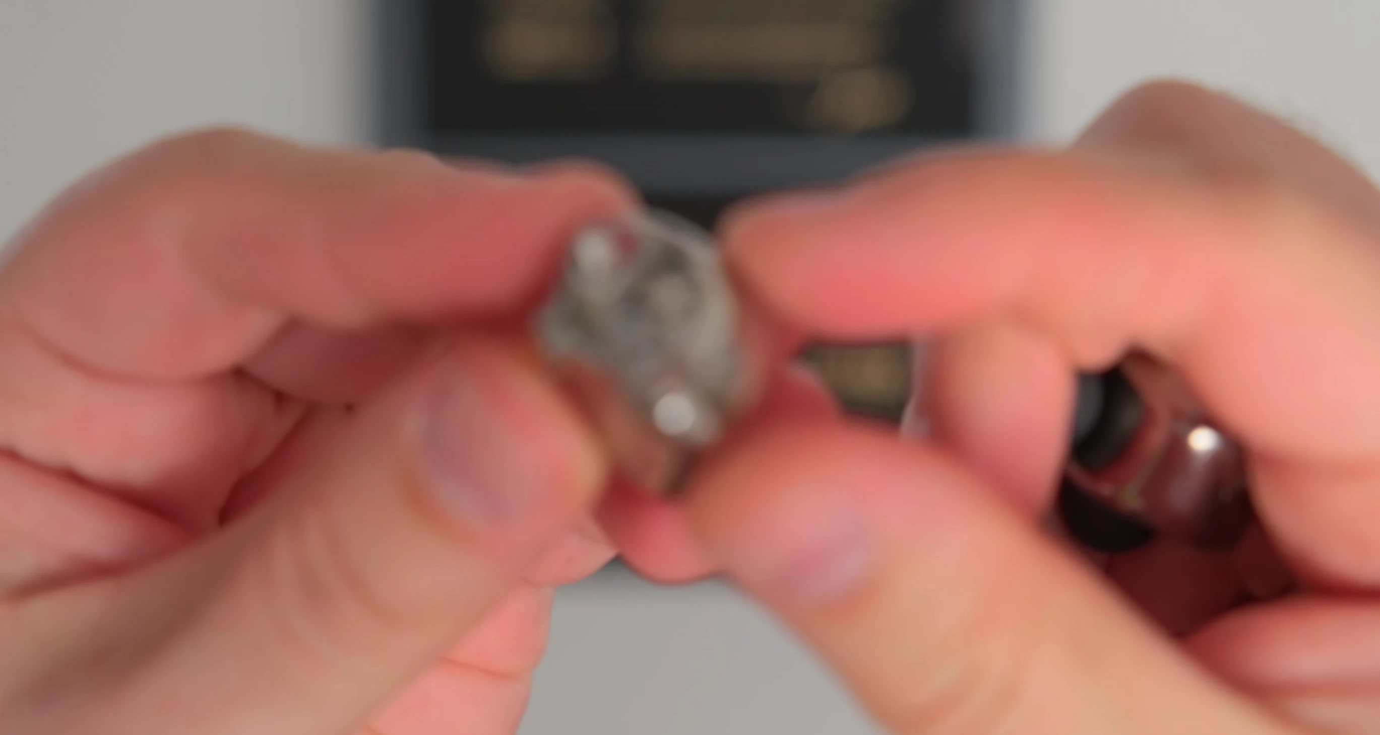 Image showing the ergonomic design of the FX17 in the reviewer's ear.