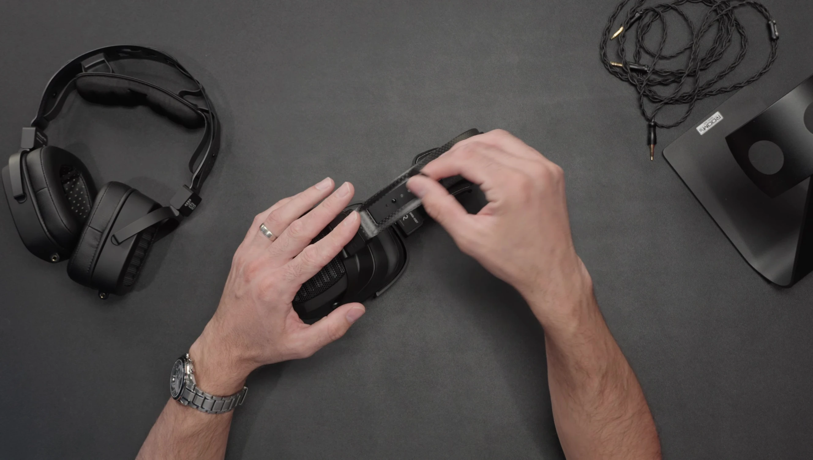 A shot emphasizing the weight and size of the headphones.