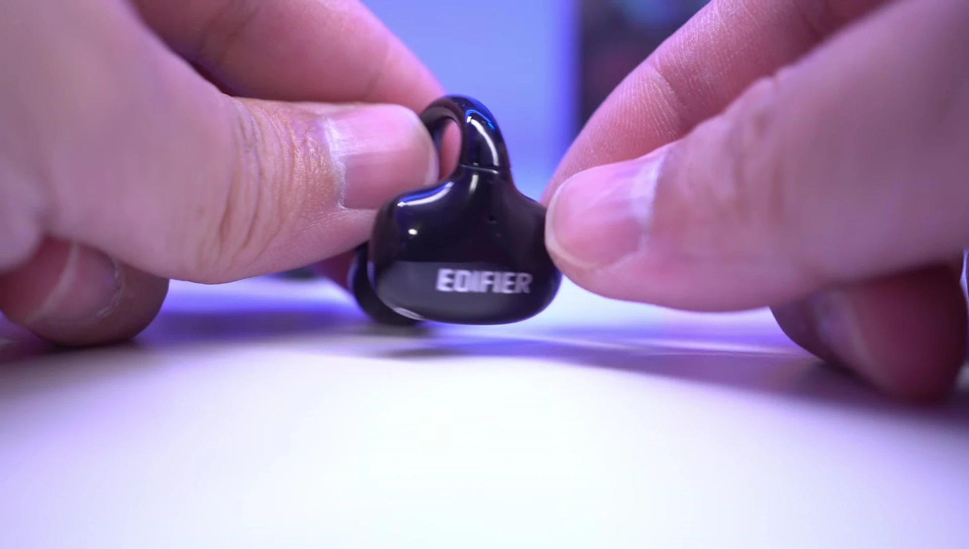 Close-up shot of the microphone on the earbuds.