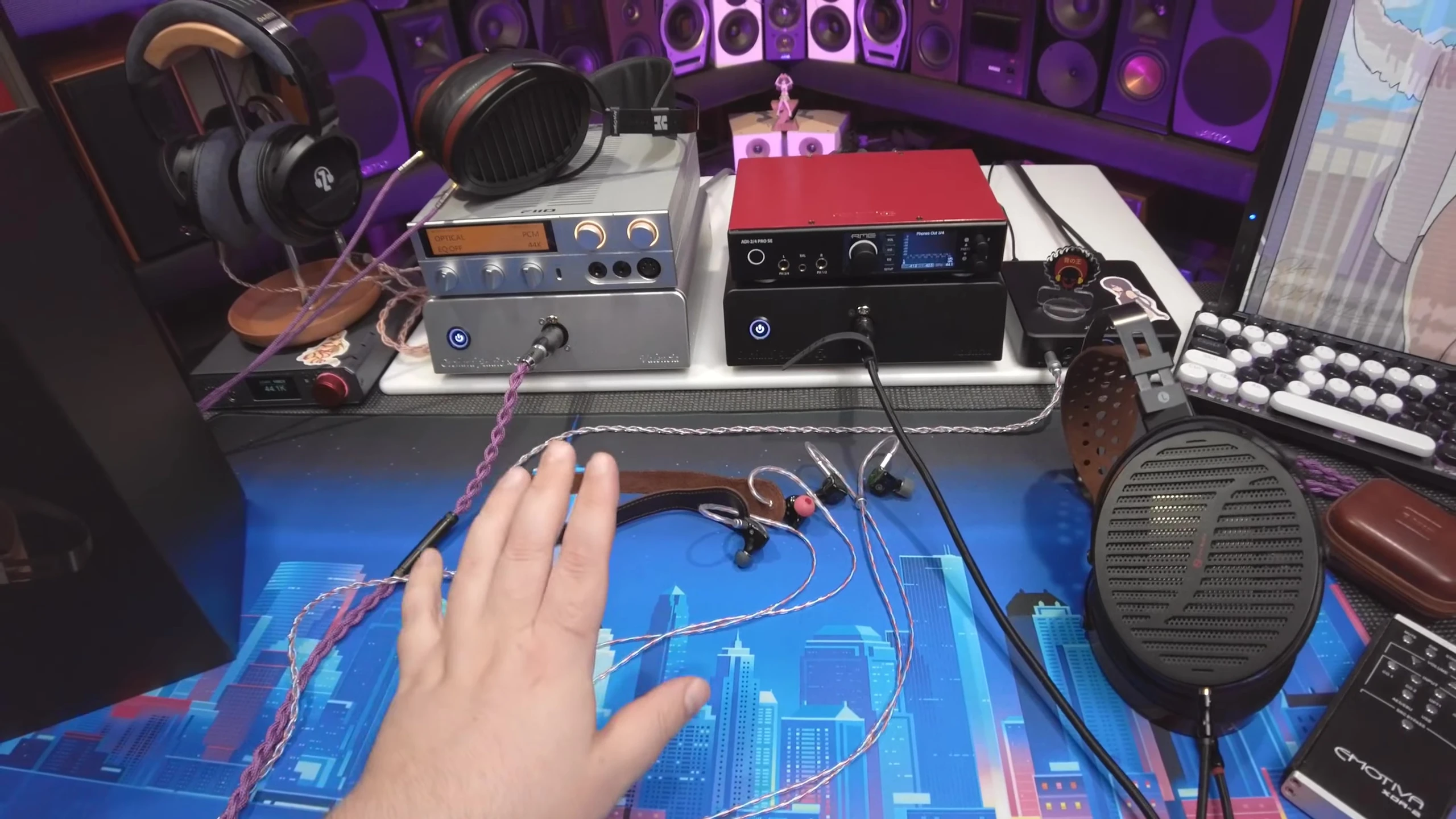 The reviewer wearing the headphones while showcasing the comfort.