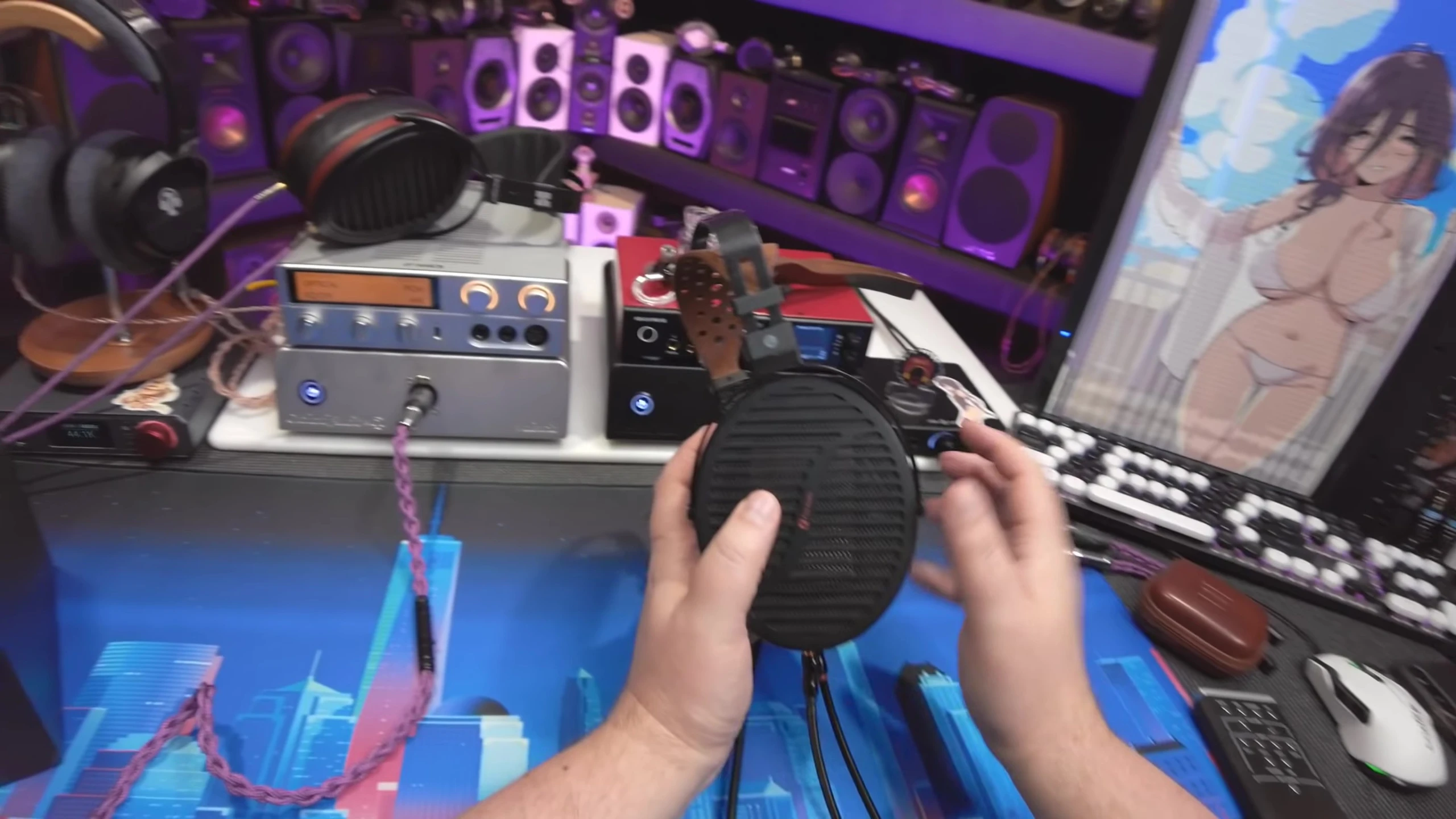 Close-up of the massive size of the Fosi Audio i5 headphones compared to other headphones.