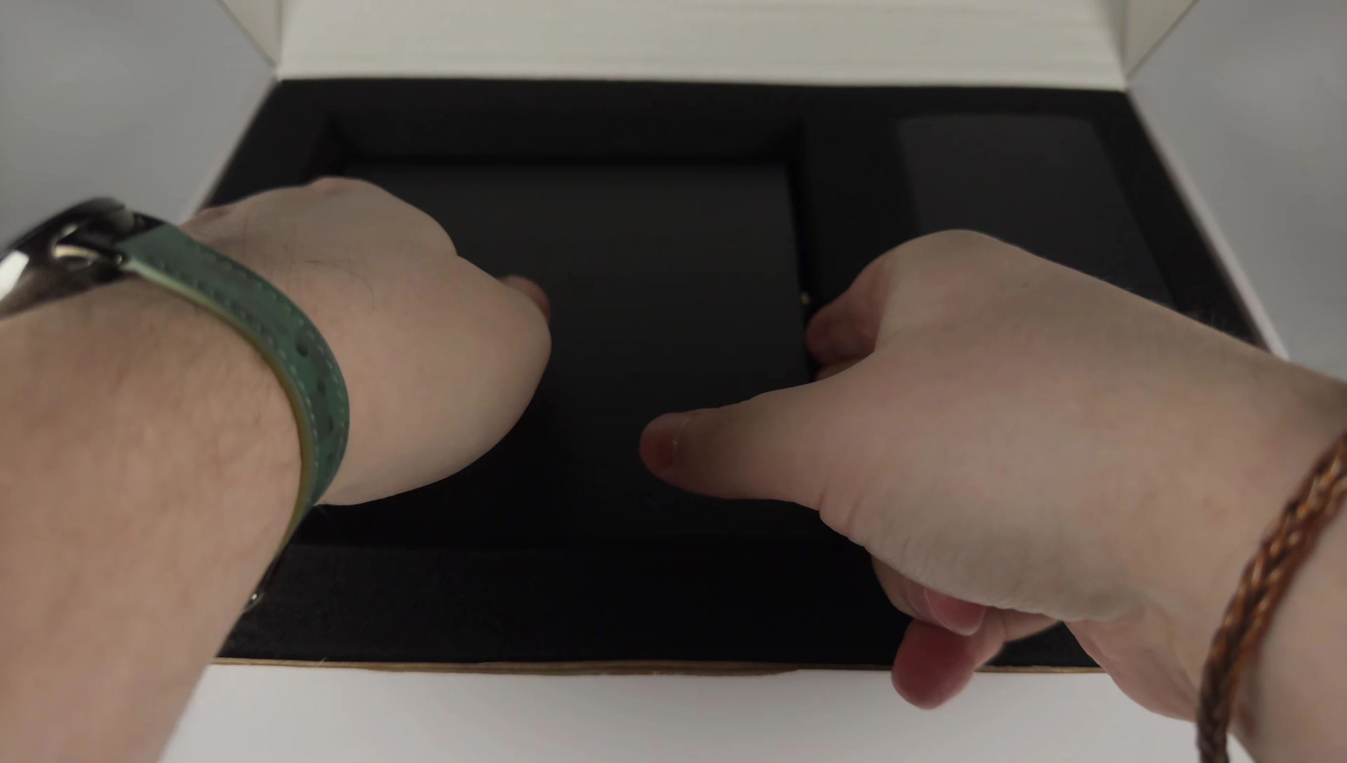 Inside the box showing the thick foam padding and device protection