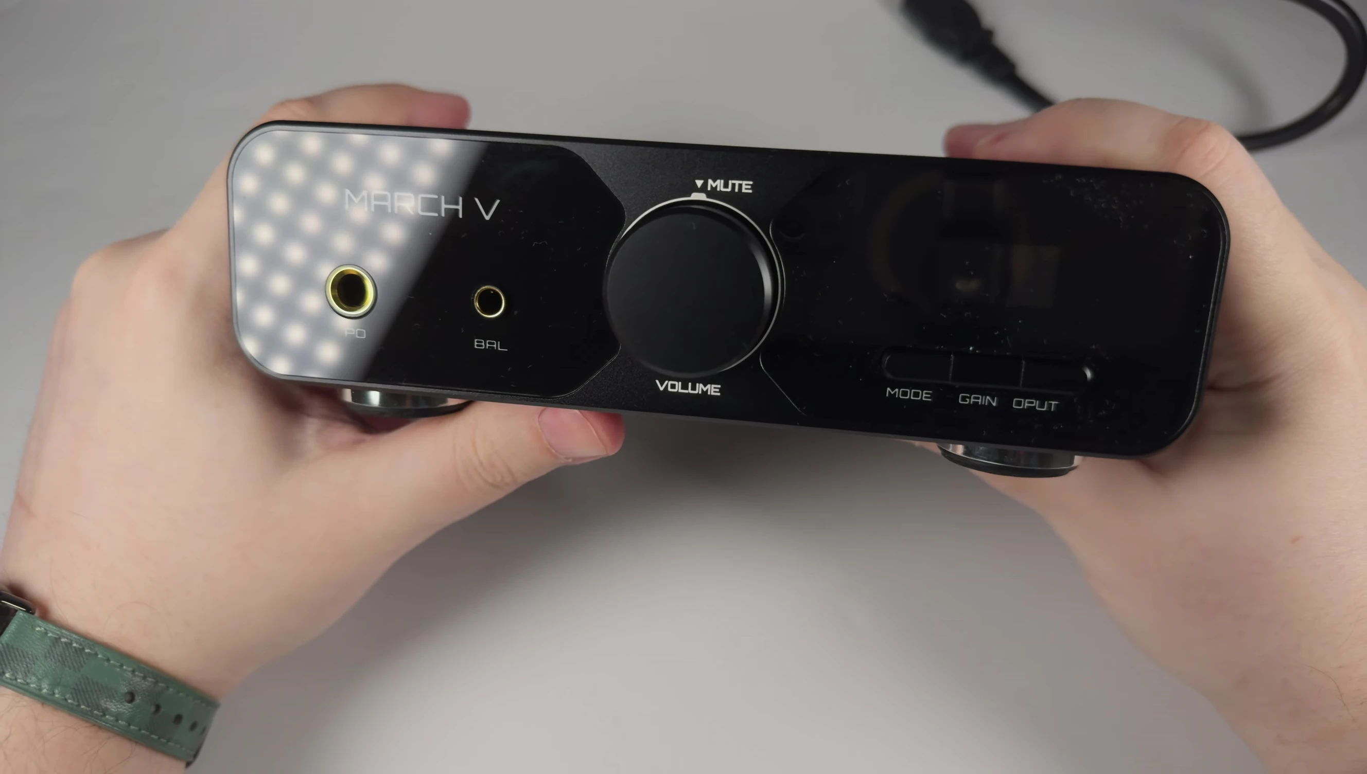 Front panel of the March V showing the headphone jacks and control buttons
