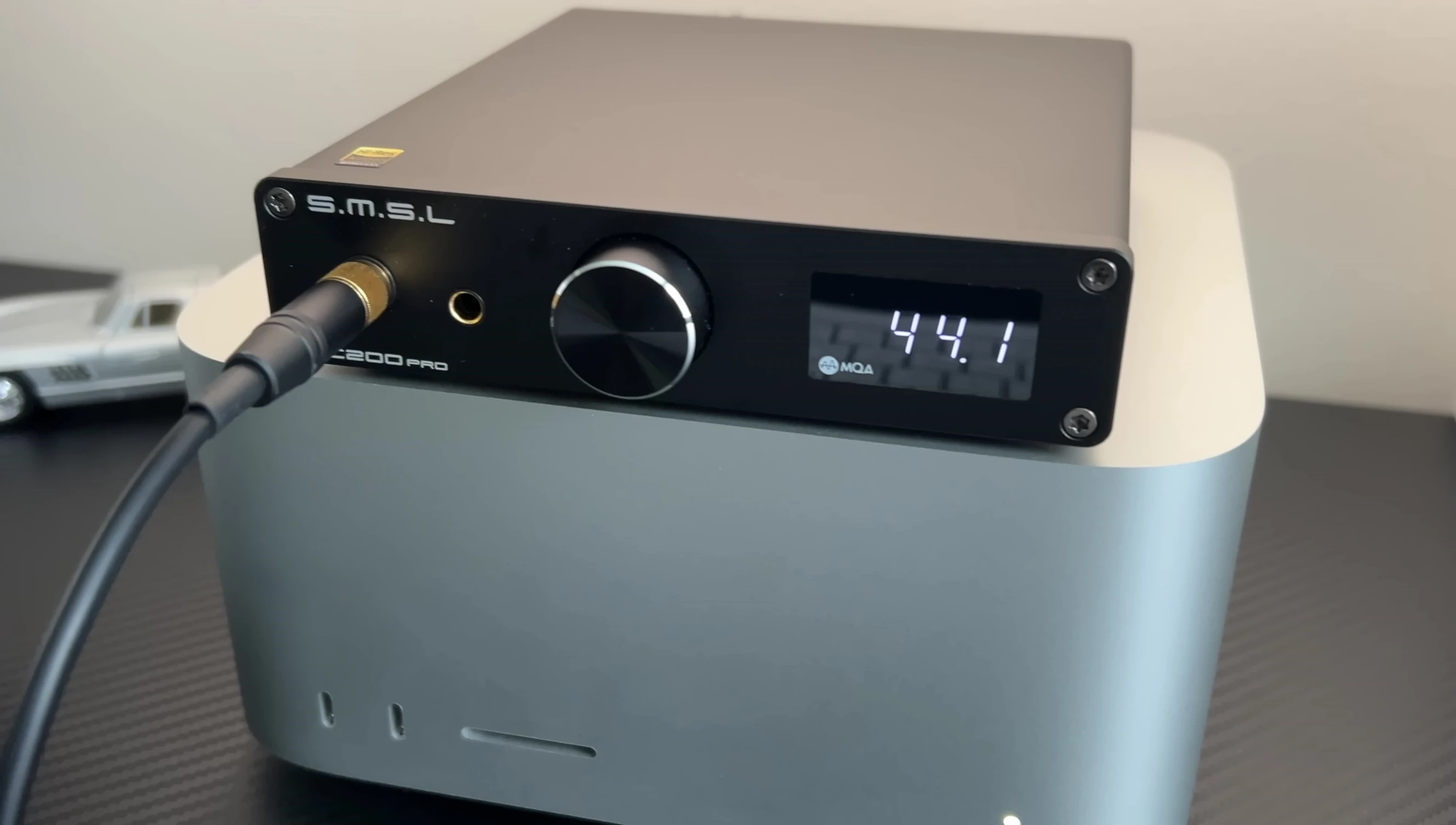 Image showing the device connected to studio monitors.