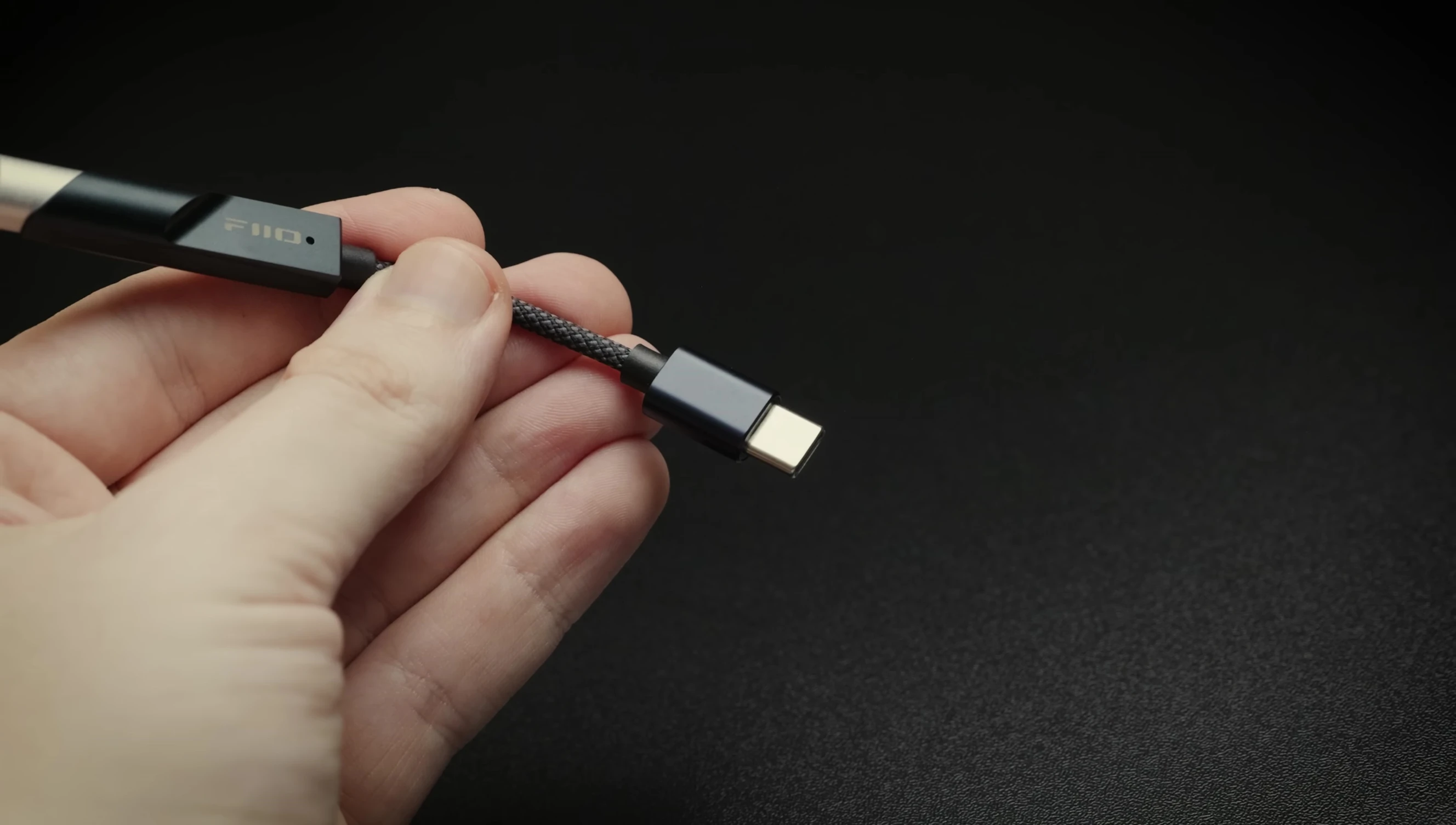 Specifications of the FiiO KA11 showing its output voltage and impedance.