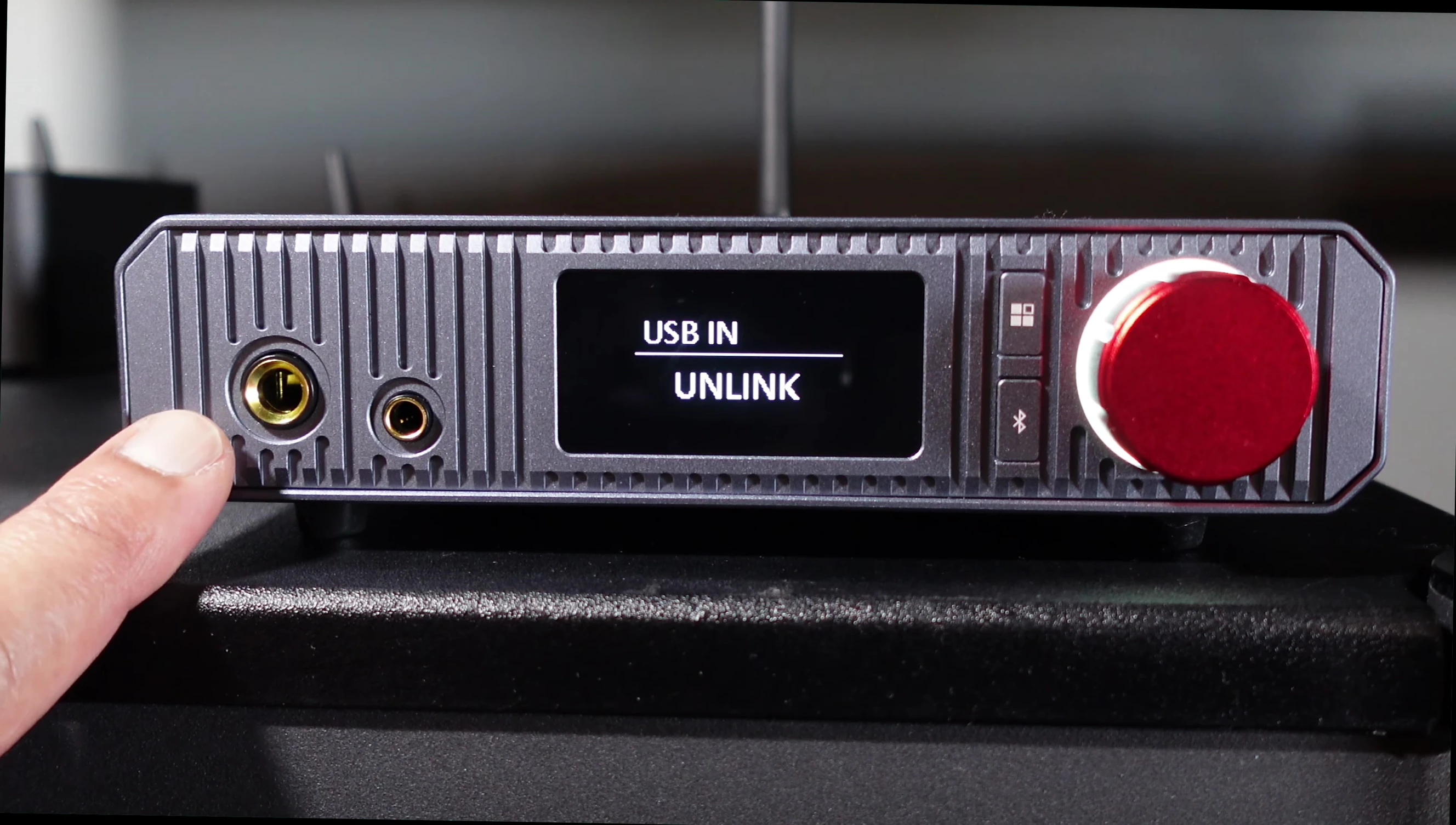 Front panel with headphone outputs and control buttons