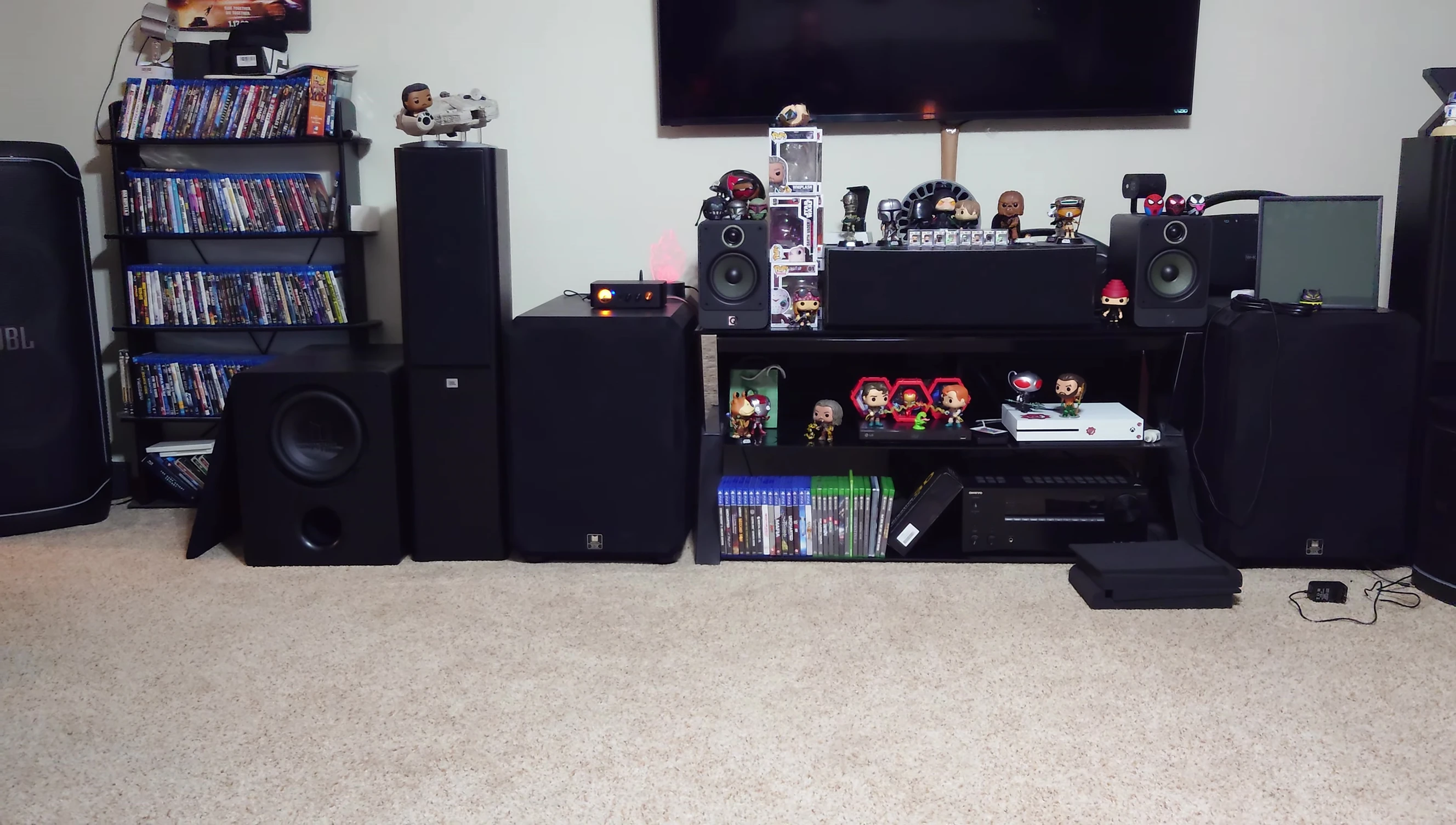 The amplifier connected to speakers and subwoofer