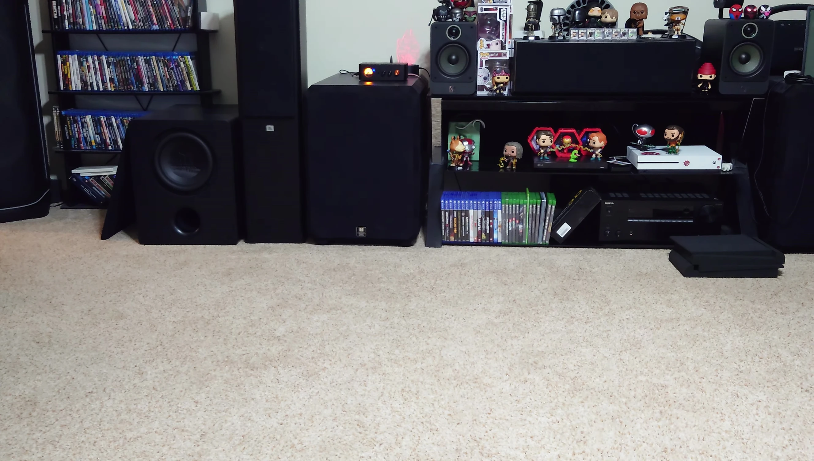 Amplifier connected to the speakers and subwoofer