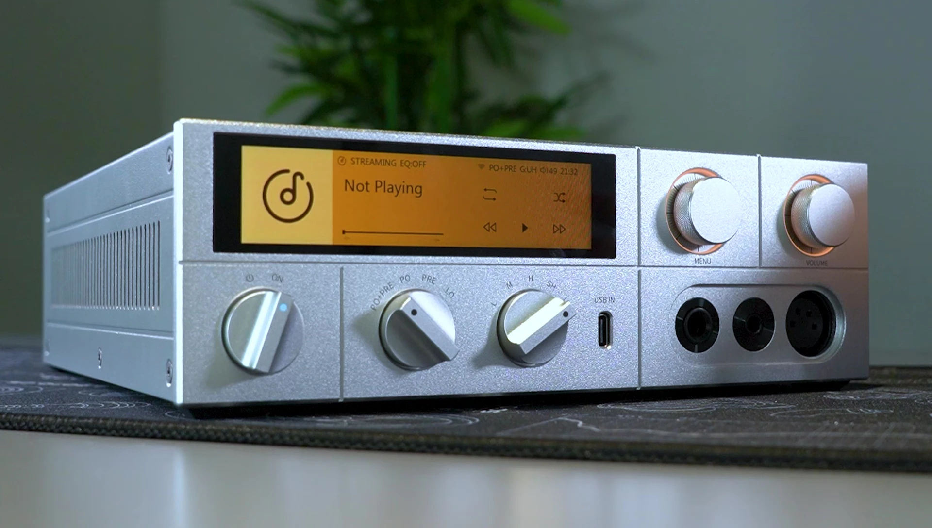 Close-up of the FiiO K17's dials, highlighting the output selection dial.