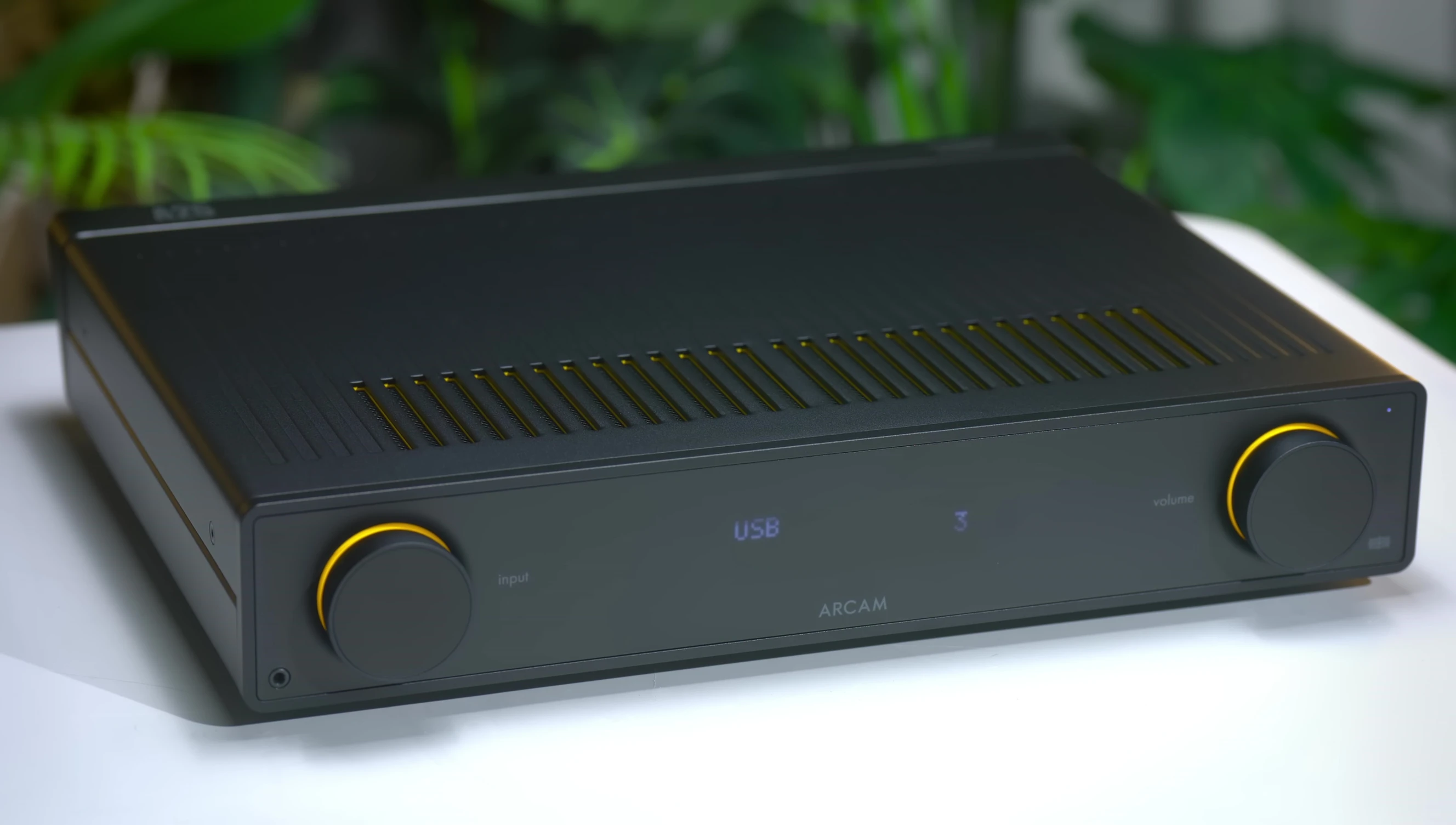 Shot showcasing the slimline profile of the Arcam A25, demonstrating its space-saving design.