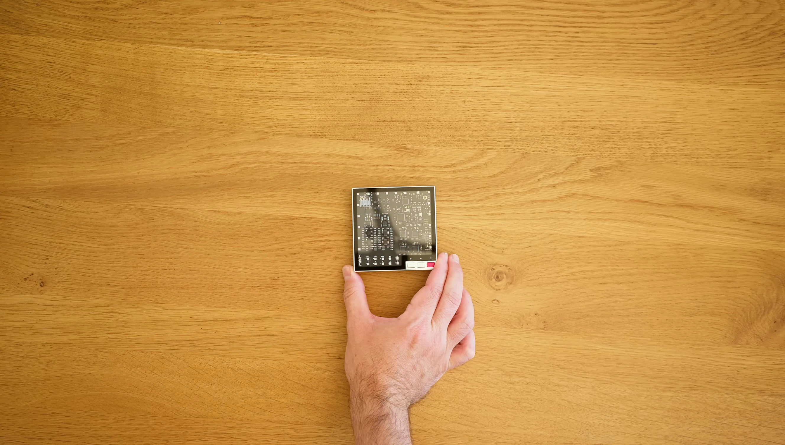 Close-up of the SMSL M20 showcasing its tiny size.