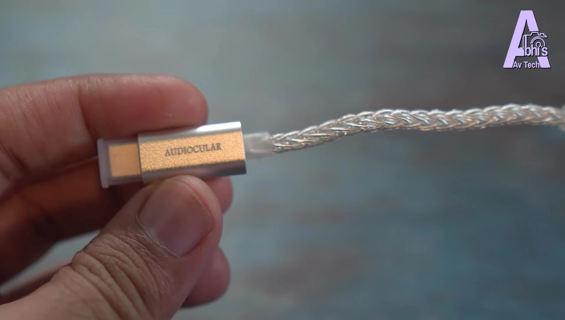 The braided cable and Audiocular branding shown