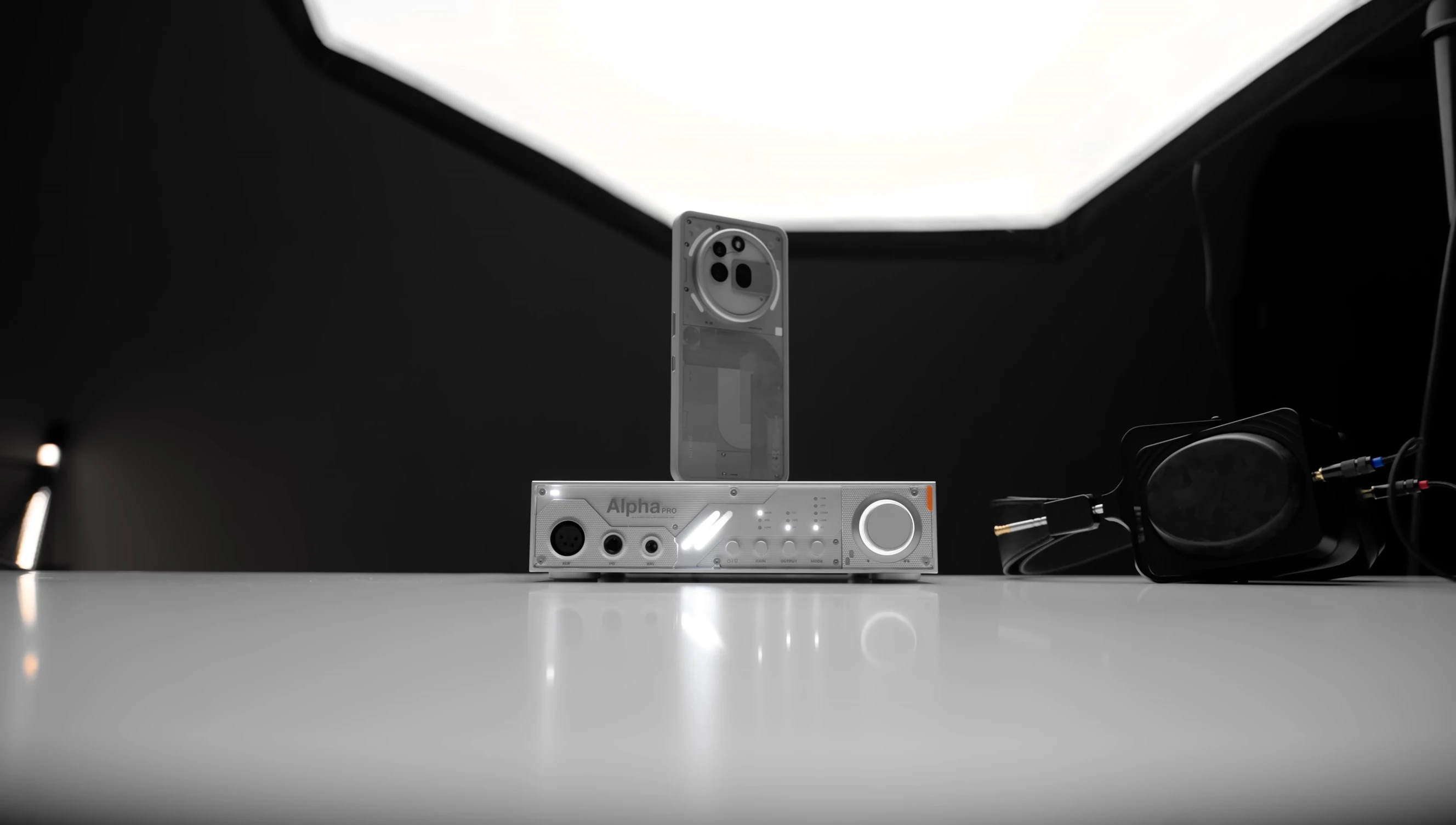 Close-up showcasing the four buttons on the Alpha Pro's front panel.
