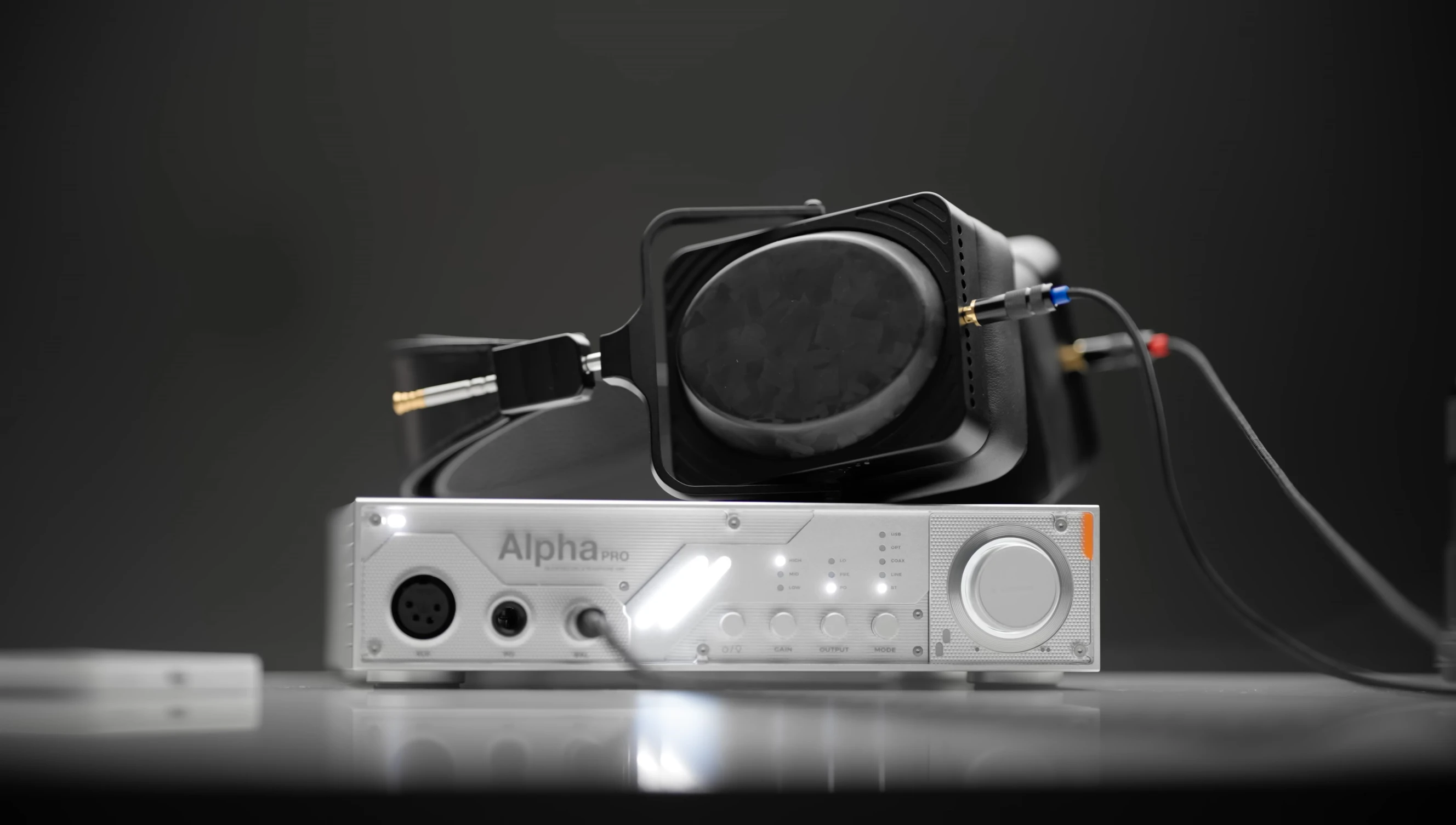 A shot emphasizing the device's ability to power demanding headphones.