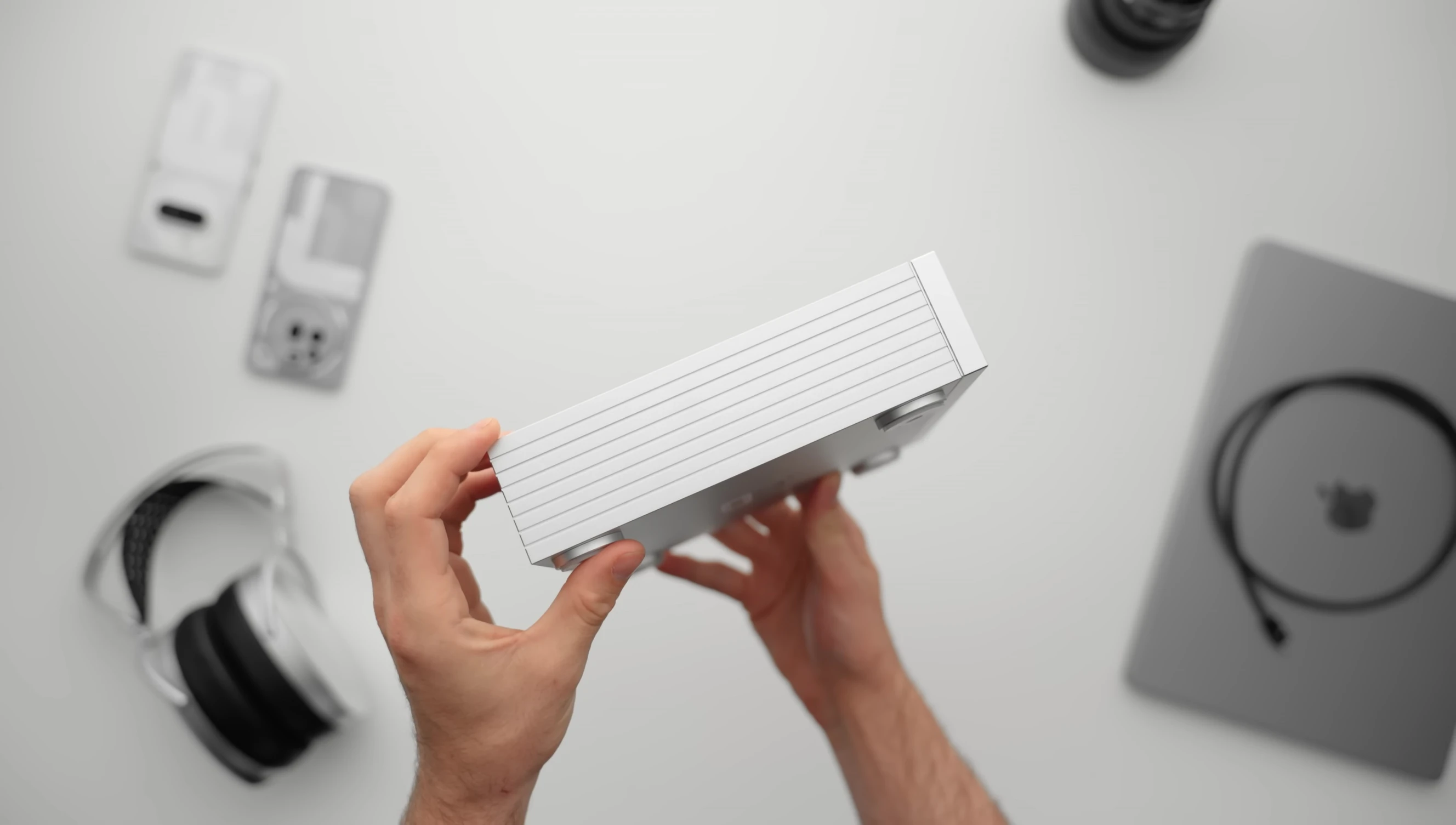 Close-up of the Alpha Pro's rectangular chassis and minimalist design.