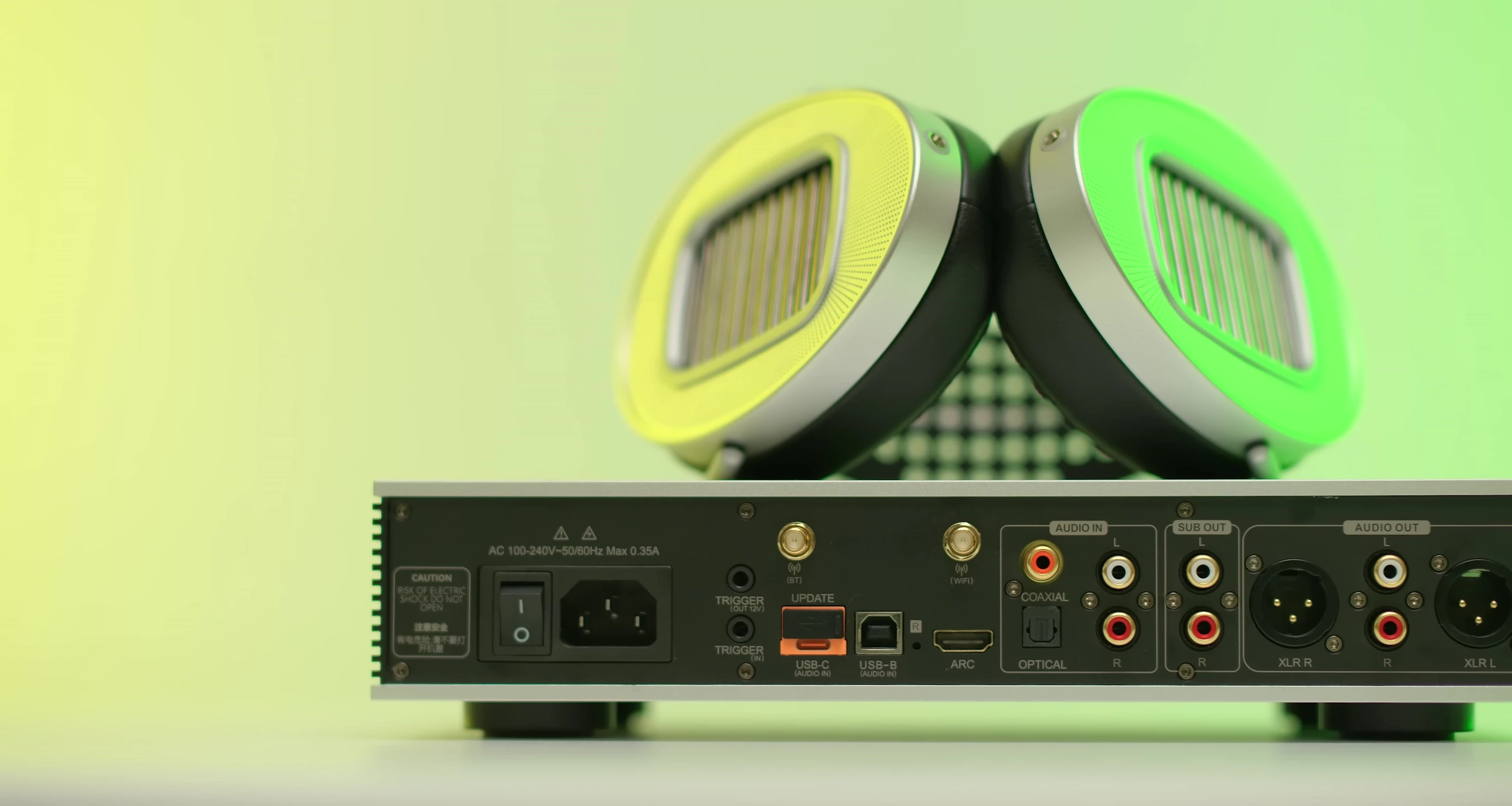 Highlighting the dual subwoofer outputs on the Luxsin X9.