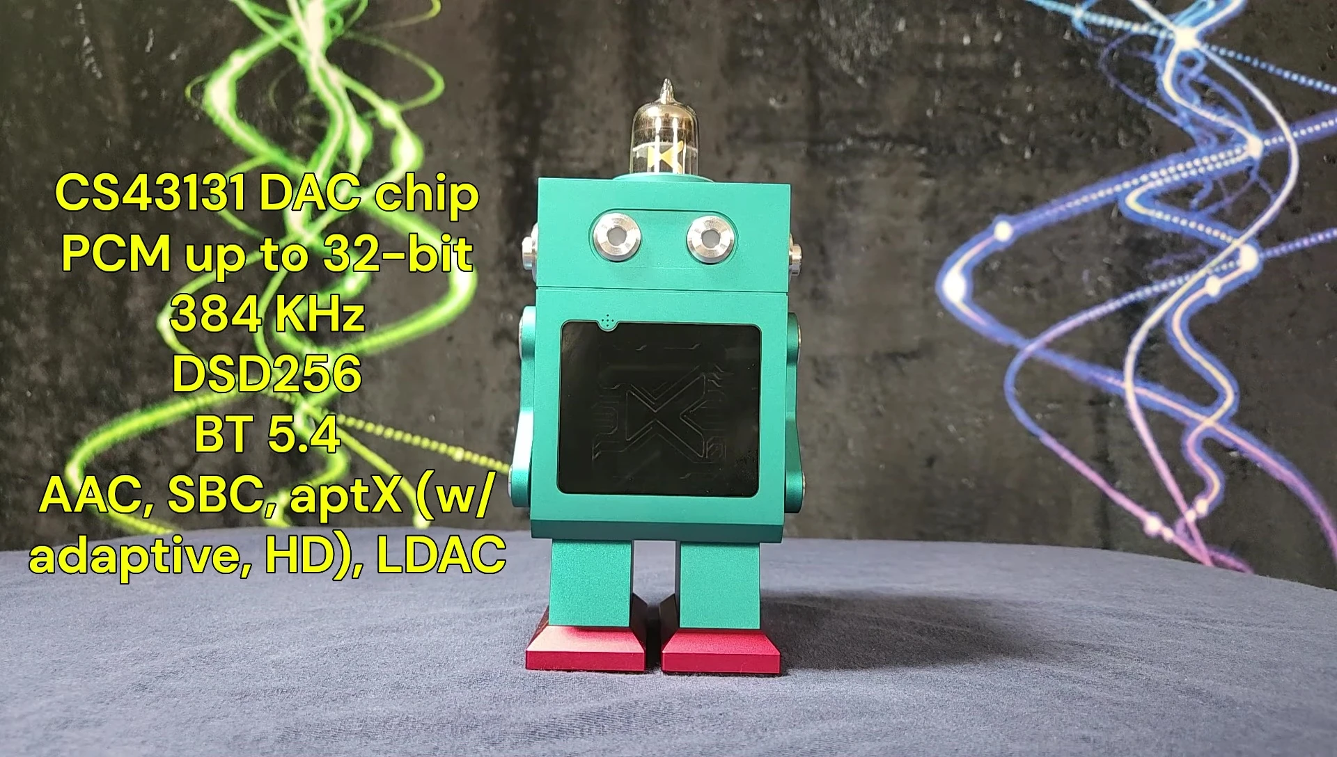 The reviewer holding the xDuoo DM-01 showing the front and side of the device.
