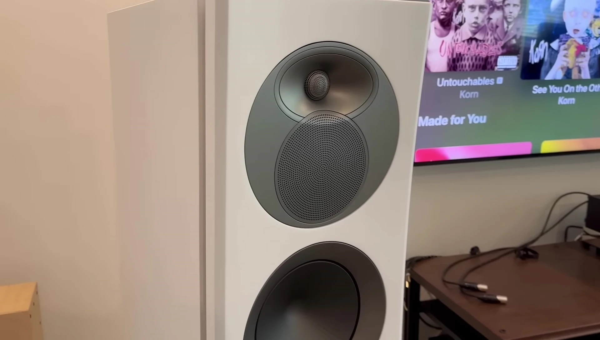 Close-up of the Arendal 1528 Monitor 8 speaker showing its height and design.