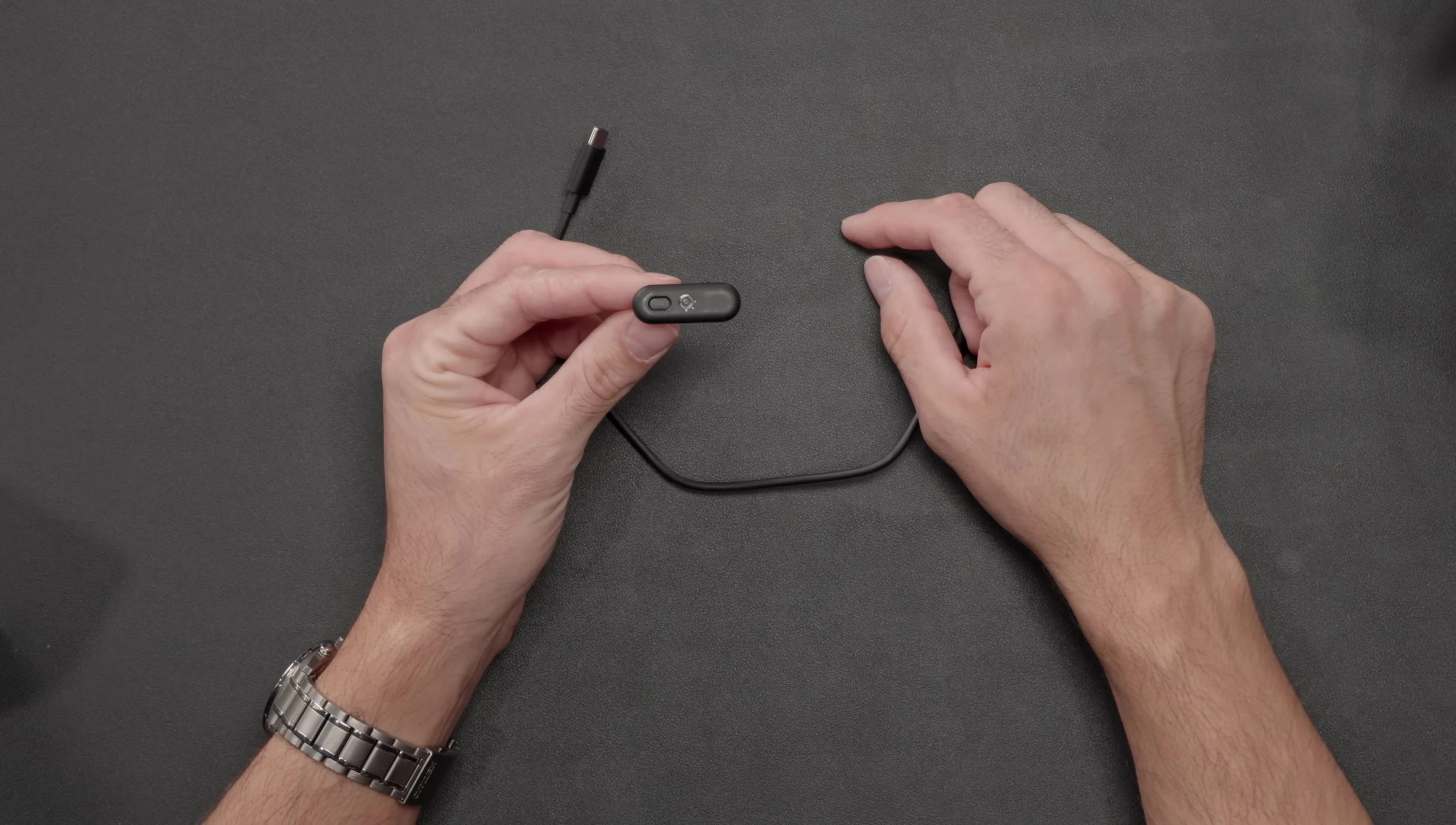 Close-up of the new, smaller wireless dongle.