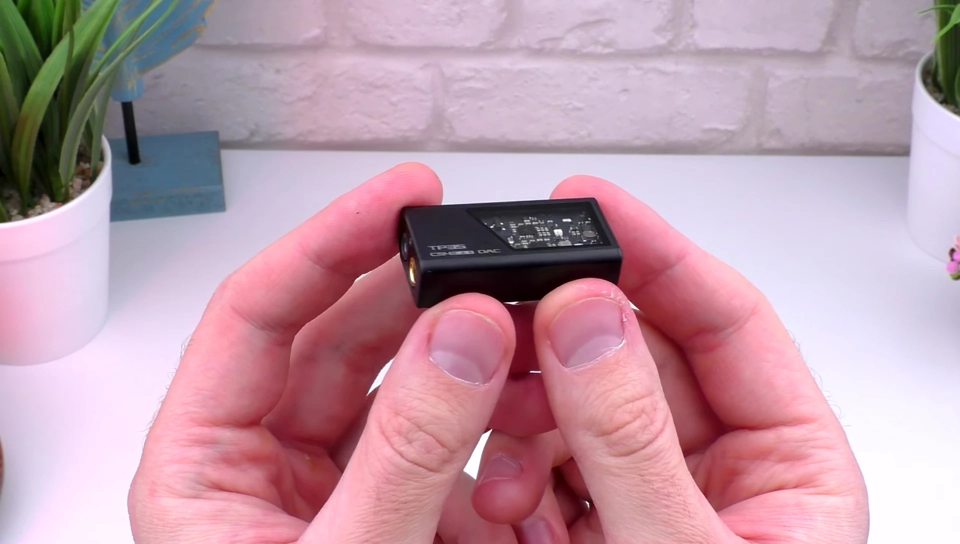 Close-up of the EPZ TP35 DAC, highlighting its compact size and aluminum casing