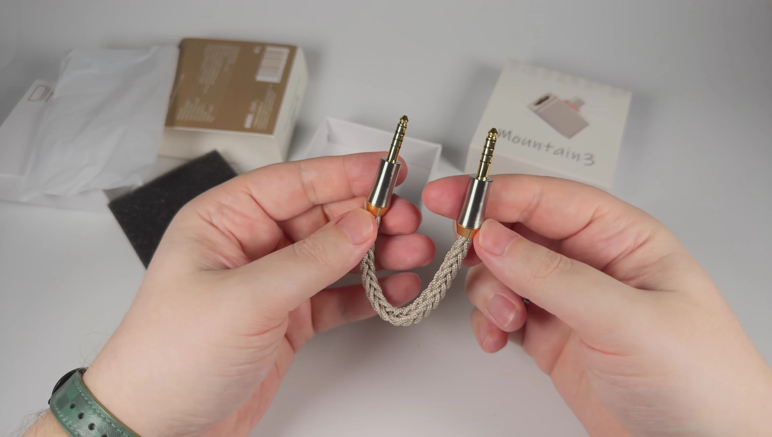 Detailed view of the titanium-shelled jacks on the BC44Net cable.