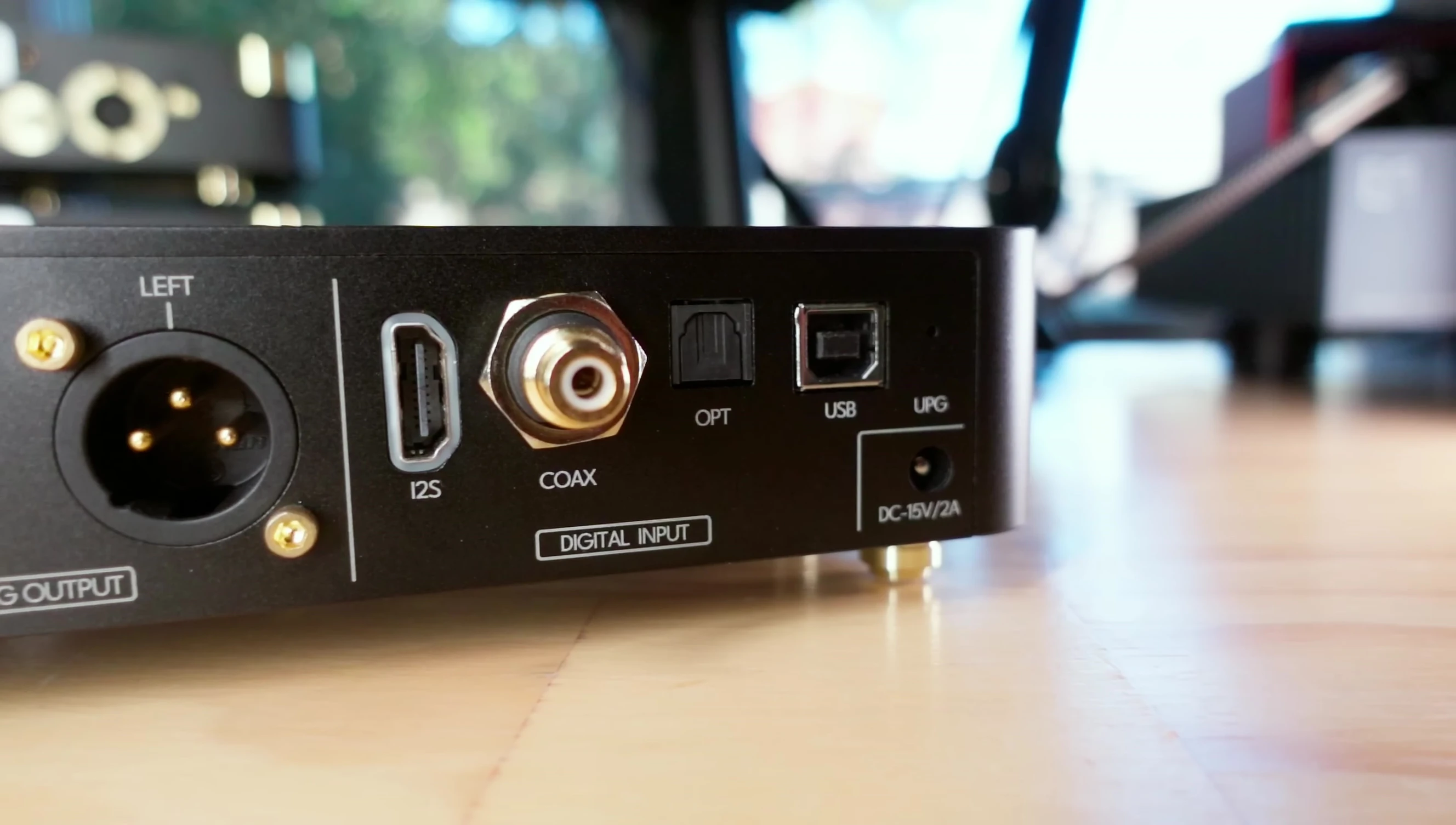 Highlighting the Micro DAC's compact size and XLR output only.
