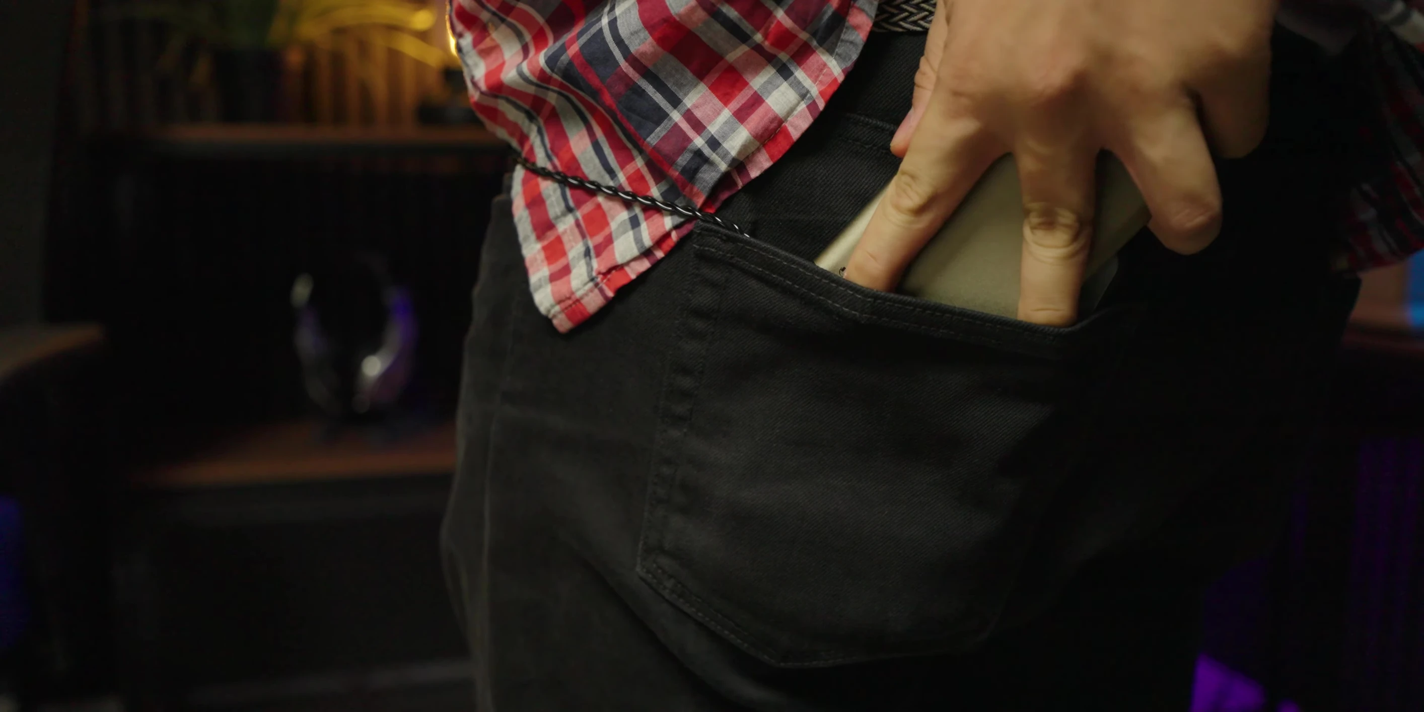 The iFi Hip-DAC 3 in a pocket, illustrating the potential for scratches.
