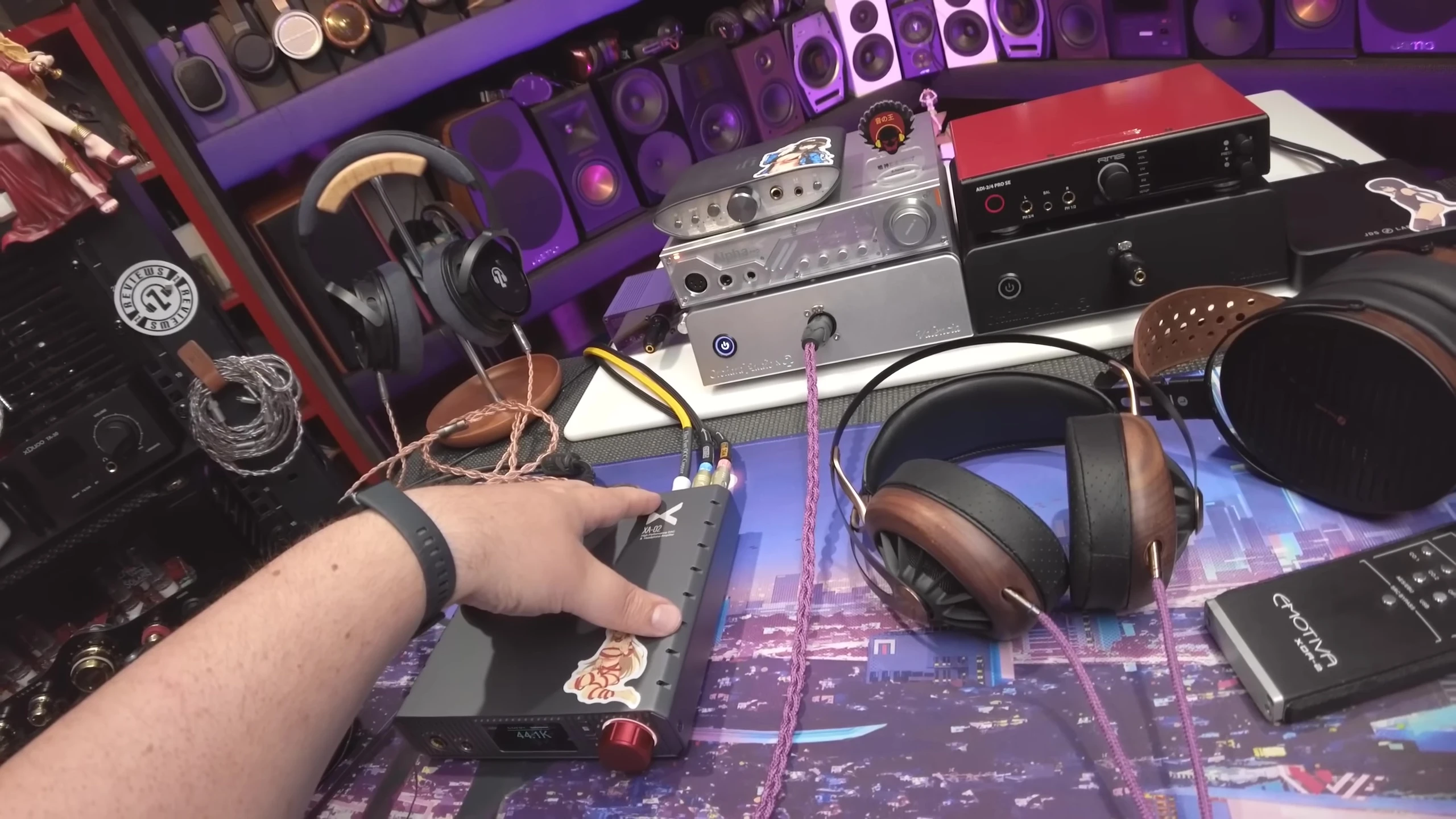 Comparison shot showcasing the Xduoo XA-02 alongside competitor