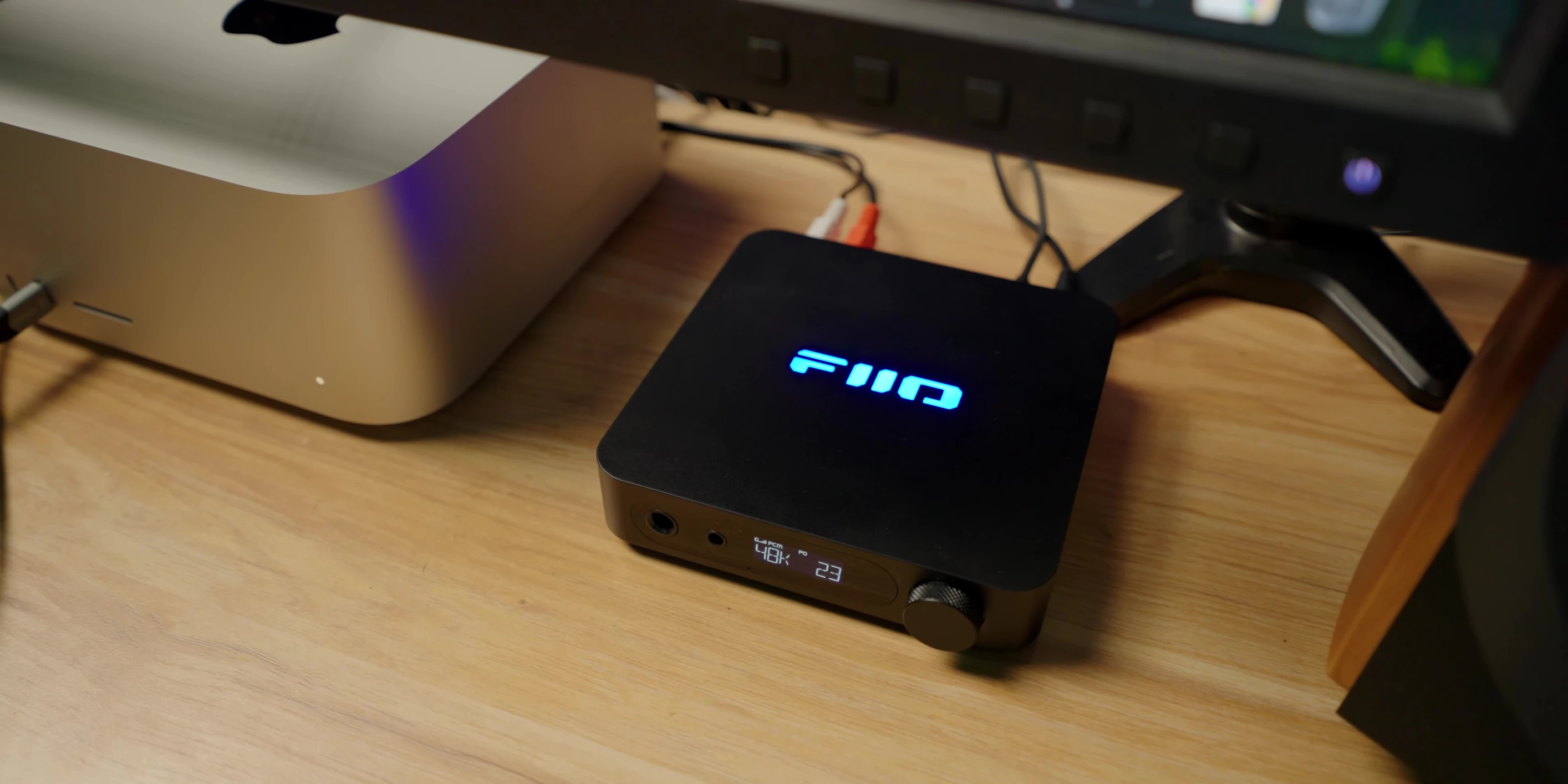 Close-up shot of the Fiio K11 on a desktop.